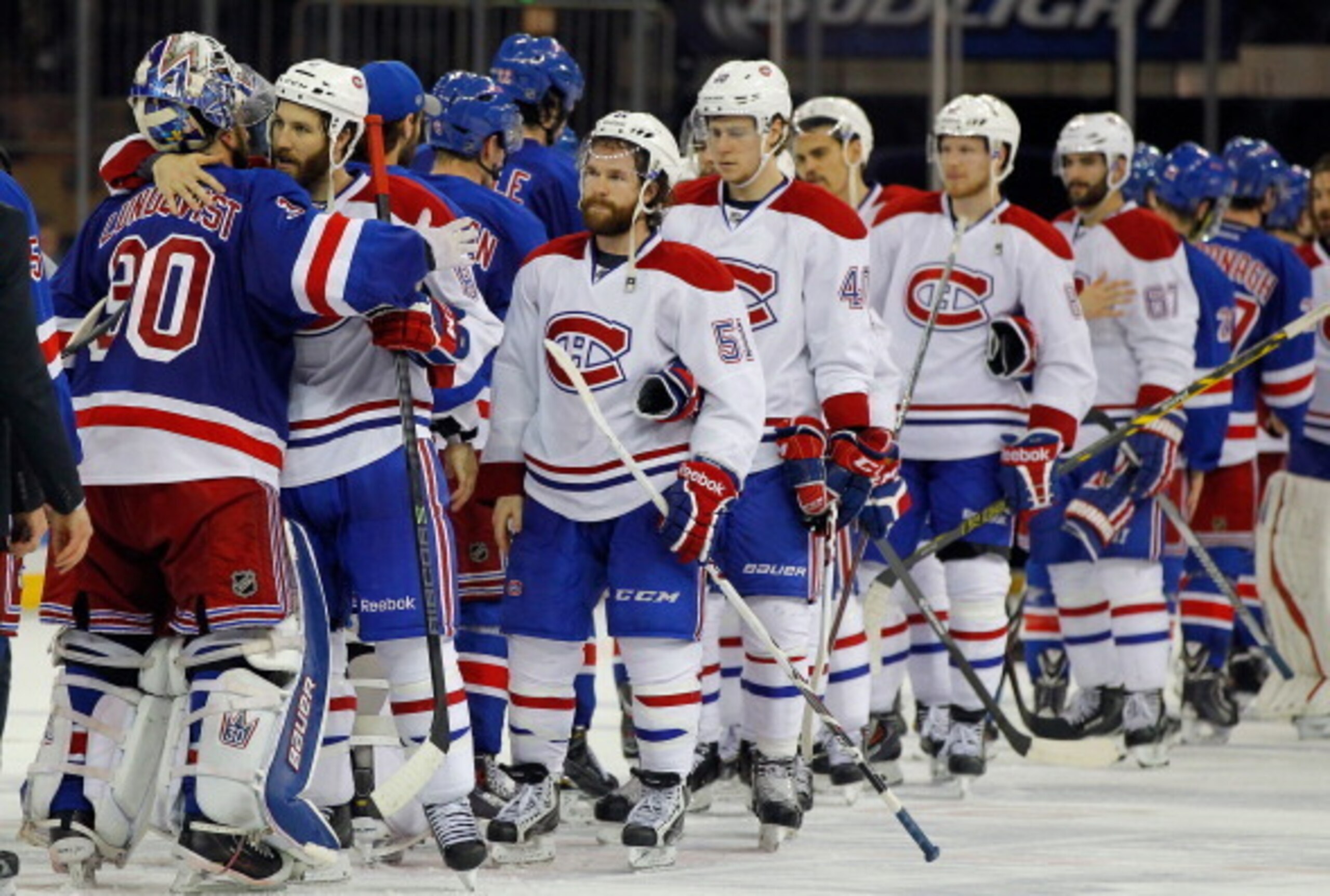 The Montreal Canadiens and New York Rangers shake hands following the 2014 Eastern Conference Final.