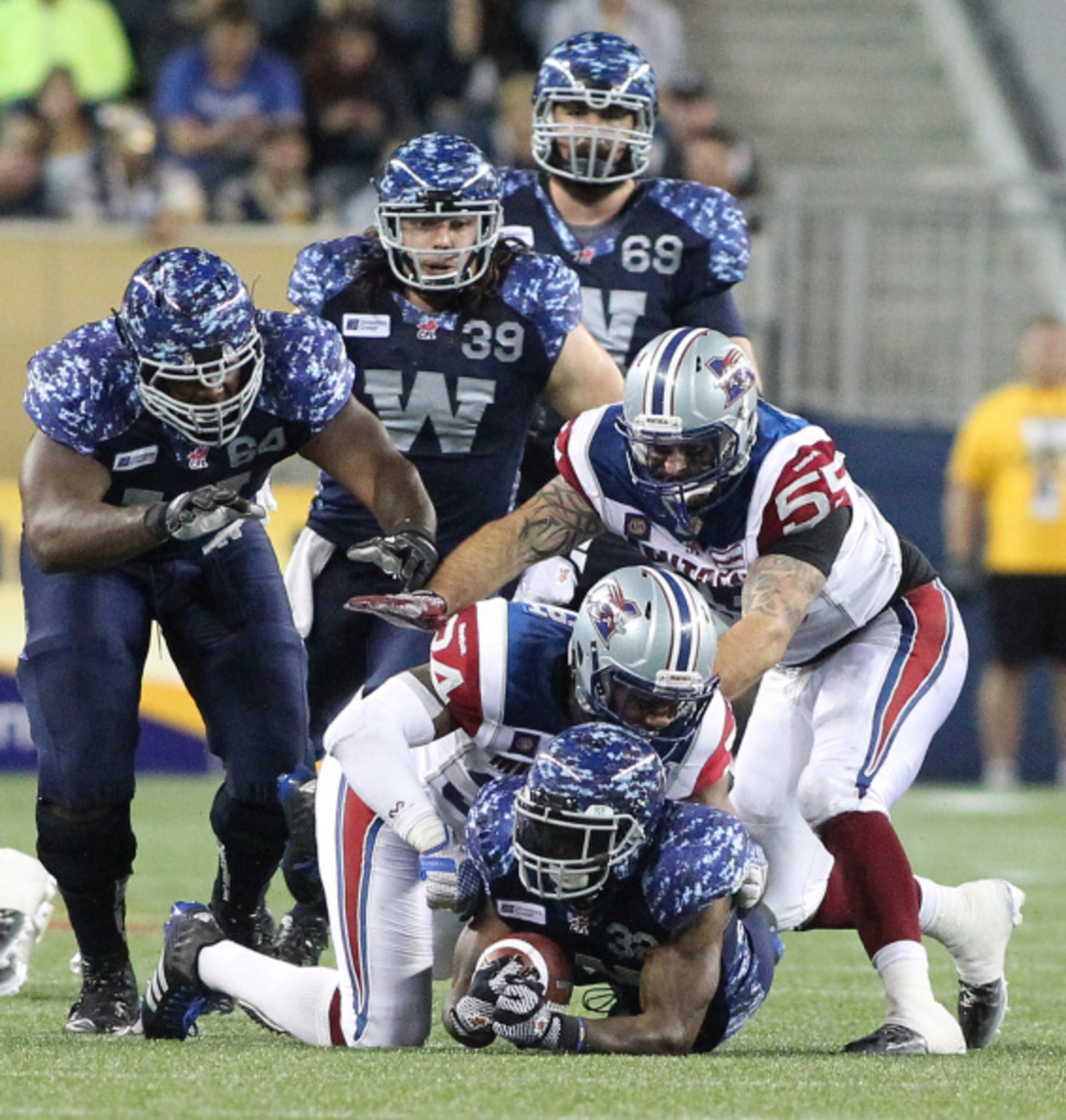 The Winnipeg Blue Bombers Signature uniforms are more blue and less bomber.