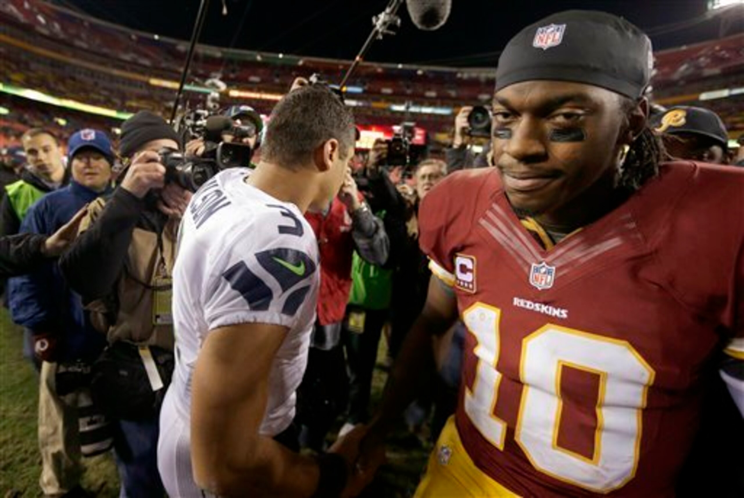 Robert Griffin III will again suffer defeat at the hands of Russell Wilson and the Seahawks.