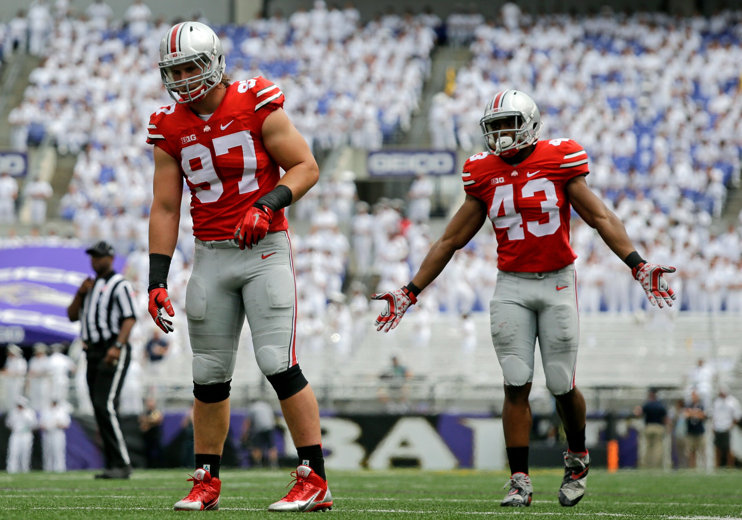 Joey Bosa (97) and Darron Lee (43) will each play big roles on a revamped Ohio State defense. Joey Bosa (97) and Darron Lee (43) will each play big roles on a revamped Ohio State defense.