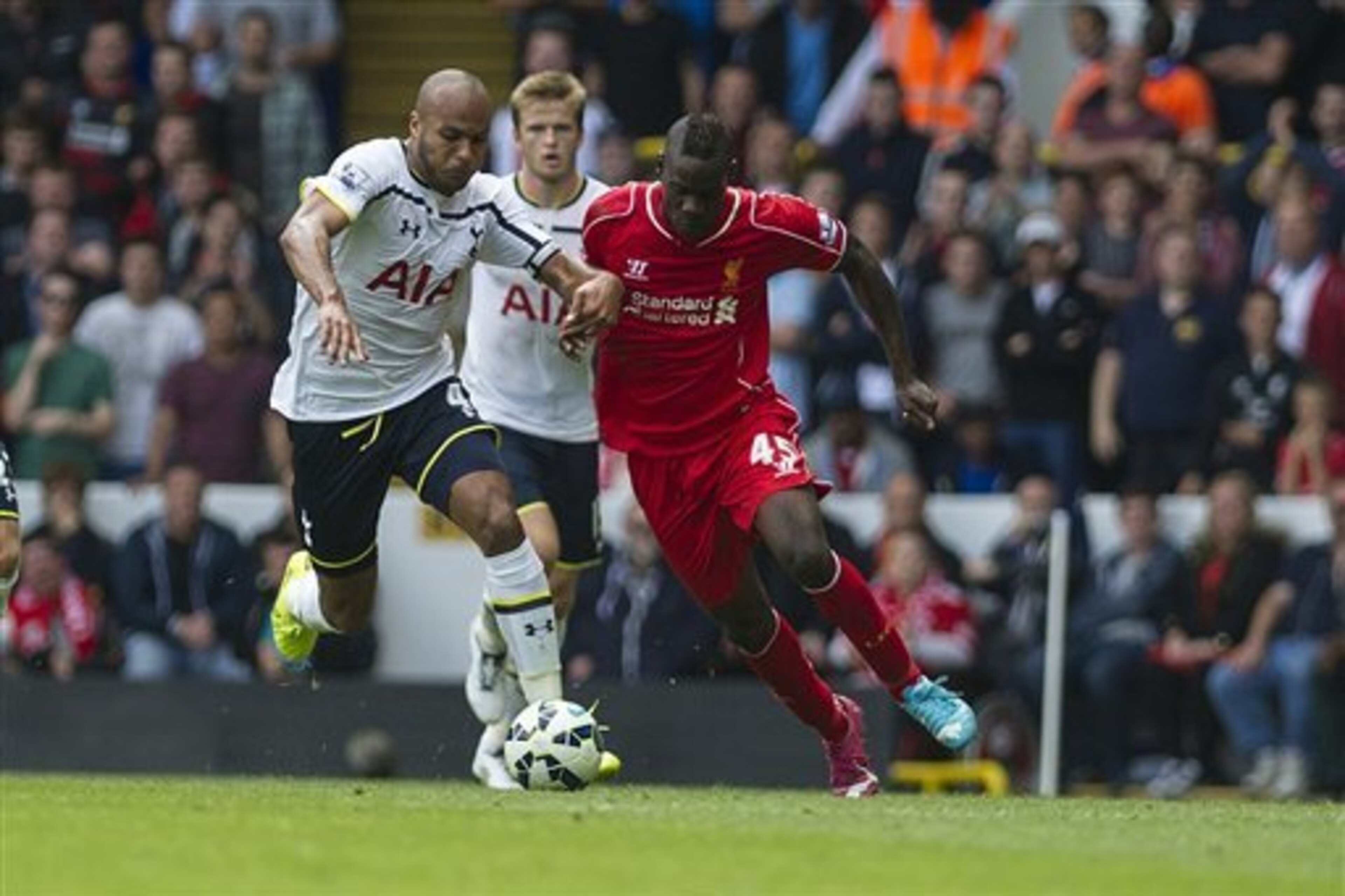 Younes Kaboul found things tough against an excellent Liverpool attack.