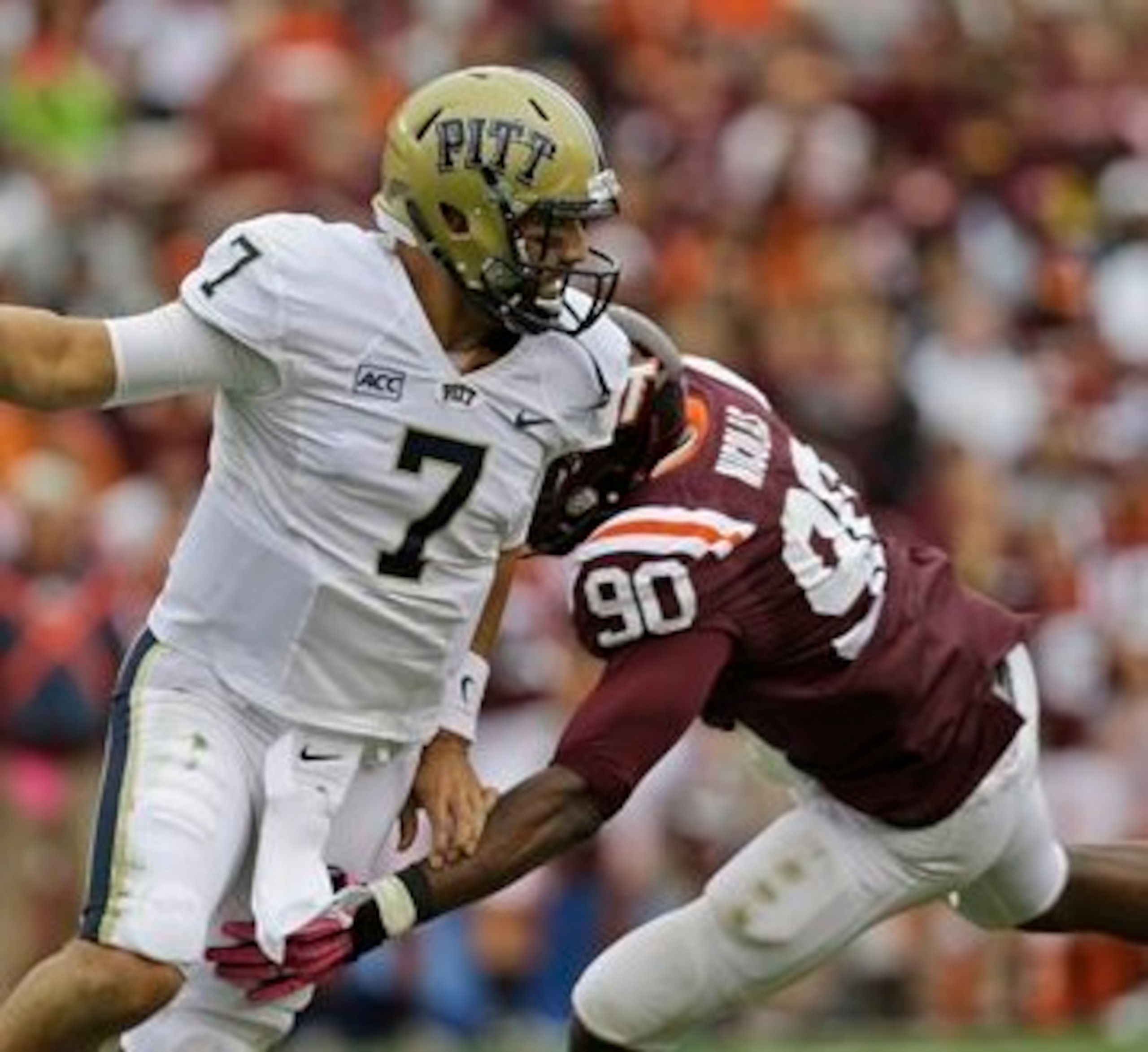 Dadi Nicolas putting heat on an opposing quarterback in 2013