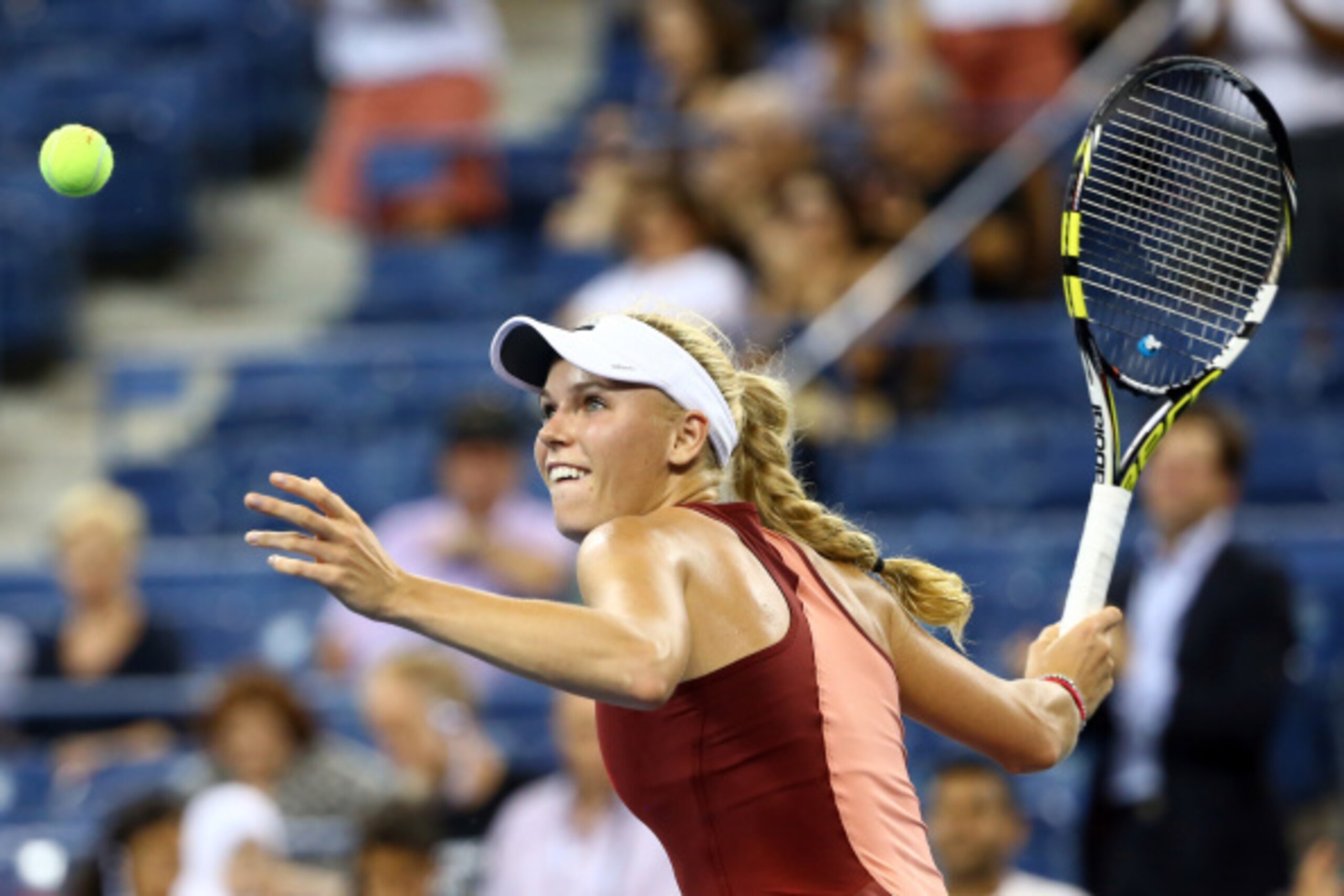 Caroline Wozniacki hits a forehand during her quarterfinal match against Sara Errani at the 2014 U.S. Open. Caroline Wozniacki hits a forehand during her quarterfinal match against Sara Errani at the 2014 U.S. Open.