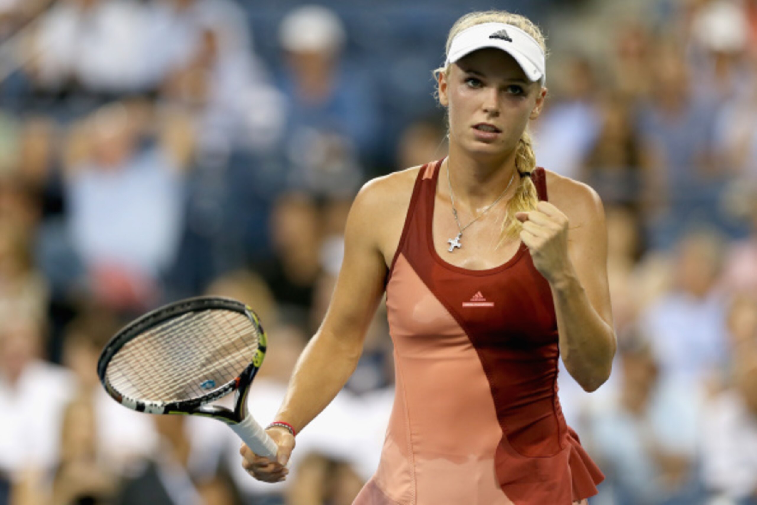 Wozniacki during her quarterfinal match at the 2014 U.S. Open. Wozniacki during her quarterfinal match at the 2014 U.S. Open.