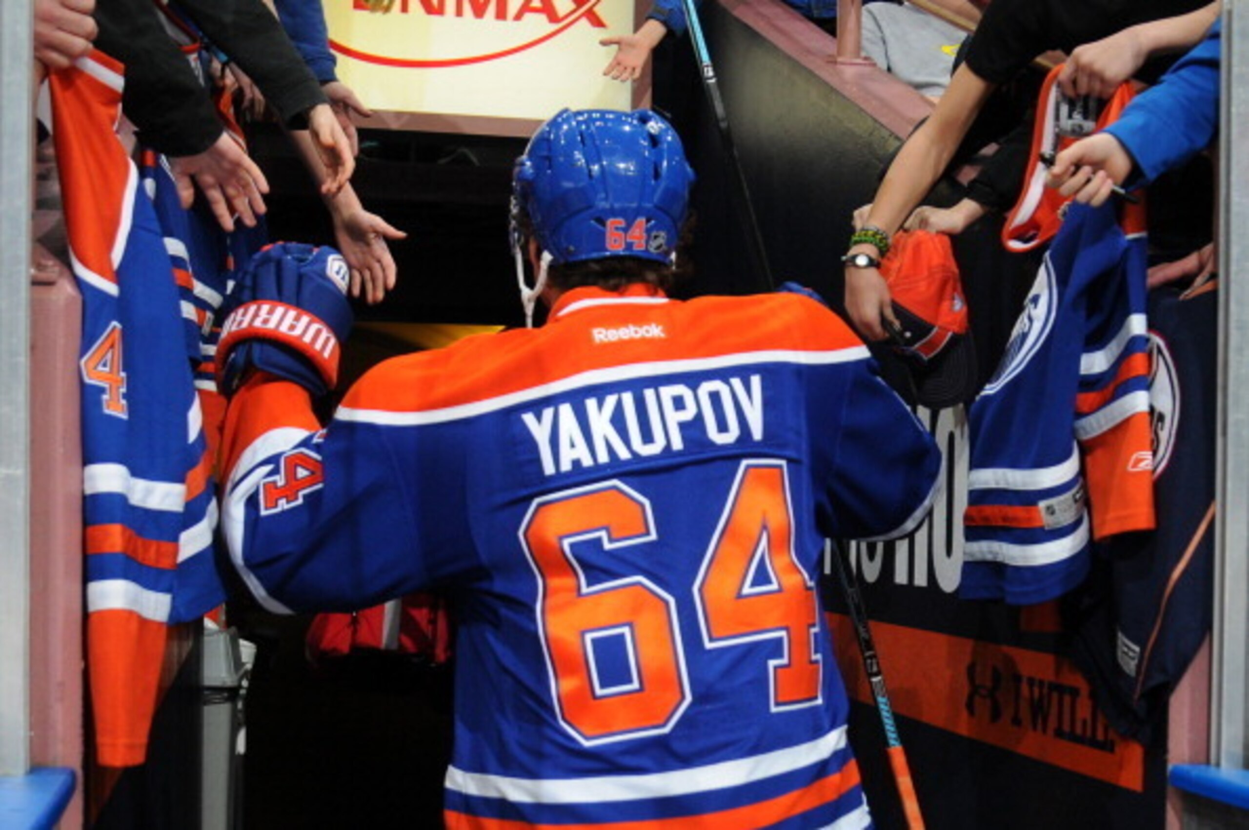 EDMONTON, AB - MARCH 6: Nail Yakupov #64 of the Edmonton Oilers makes his way to the dressing room prior to a game against the New York Islanders on March 6, 2014 at Rexall Place in Edmonton, Alberta, Canada. (Photo by Andy Devlin/NHLI via Getty Images)