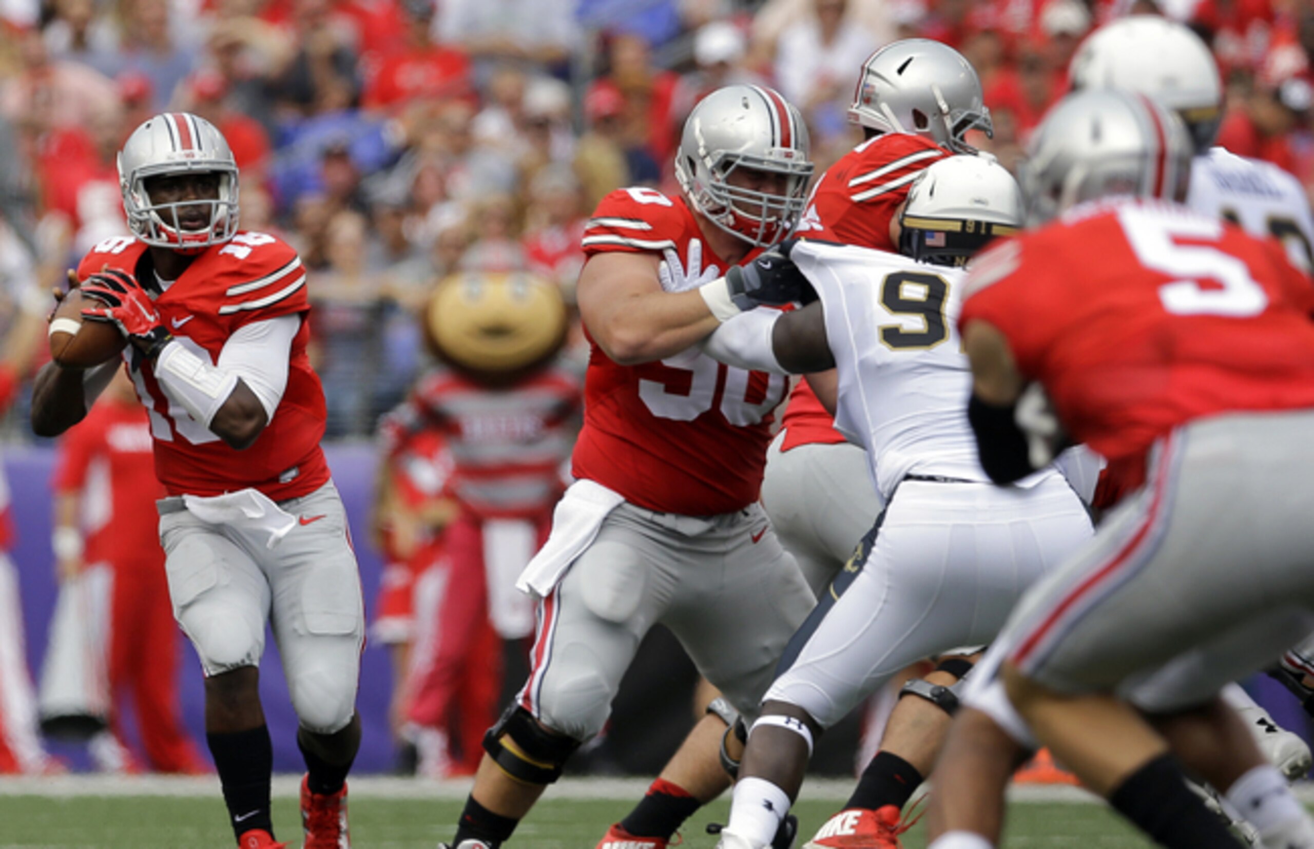 Freshman J.T. Barrett must mature quickly to help Ohio State fulfill its goals this fall.