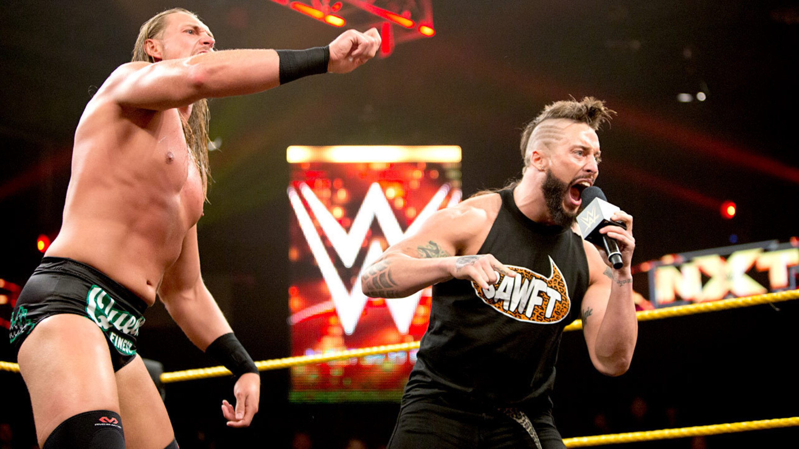 Big Cass and Enzo Amore address the NXT crowd.