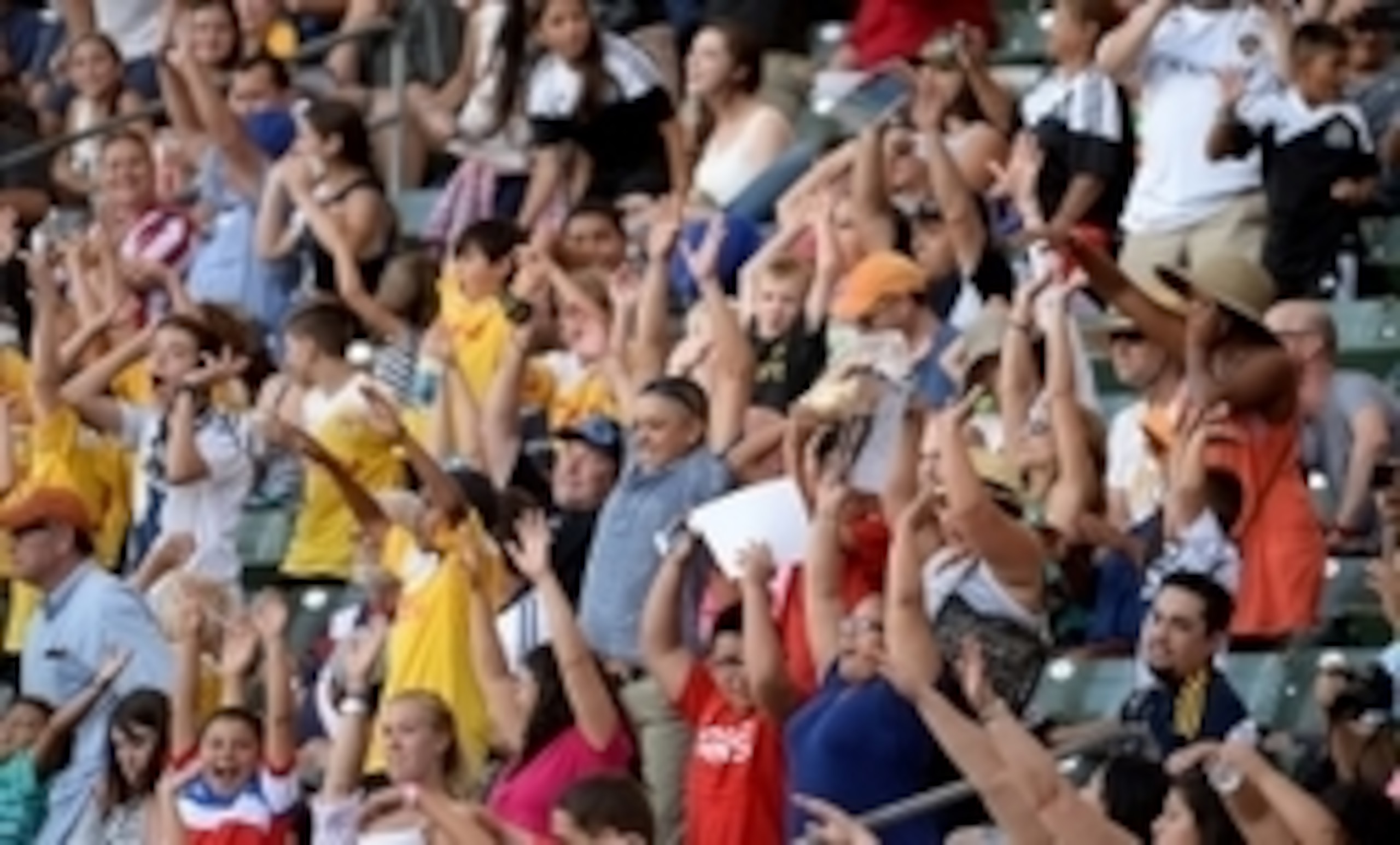 Some fans enjoy free shirts as much as the game.