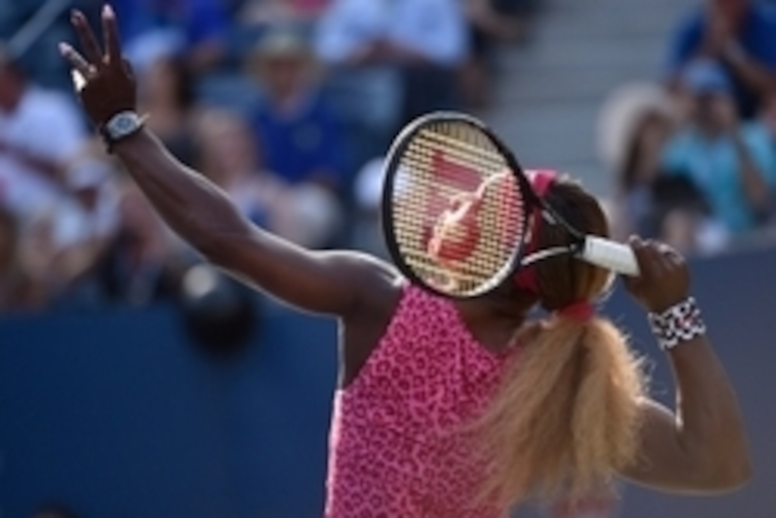 Serena Williams prepares to serve during her semifinal match at the 2014 U.S. Open.
