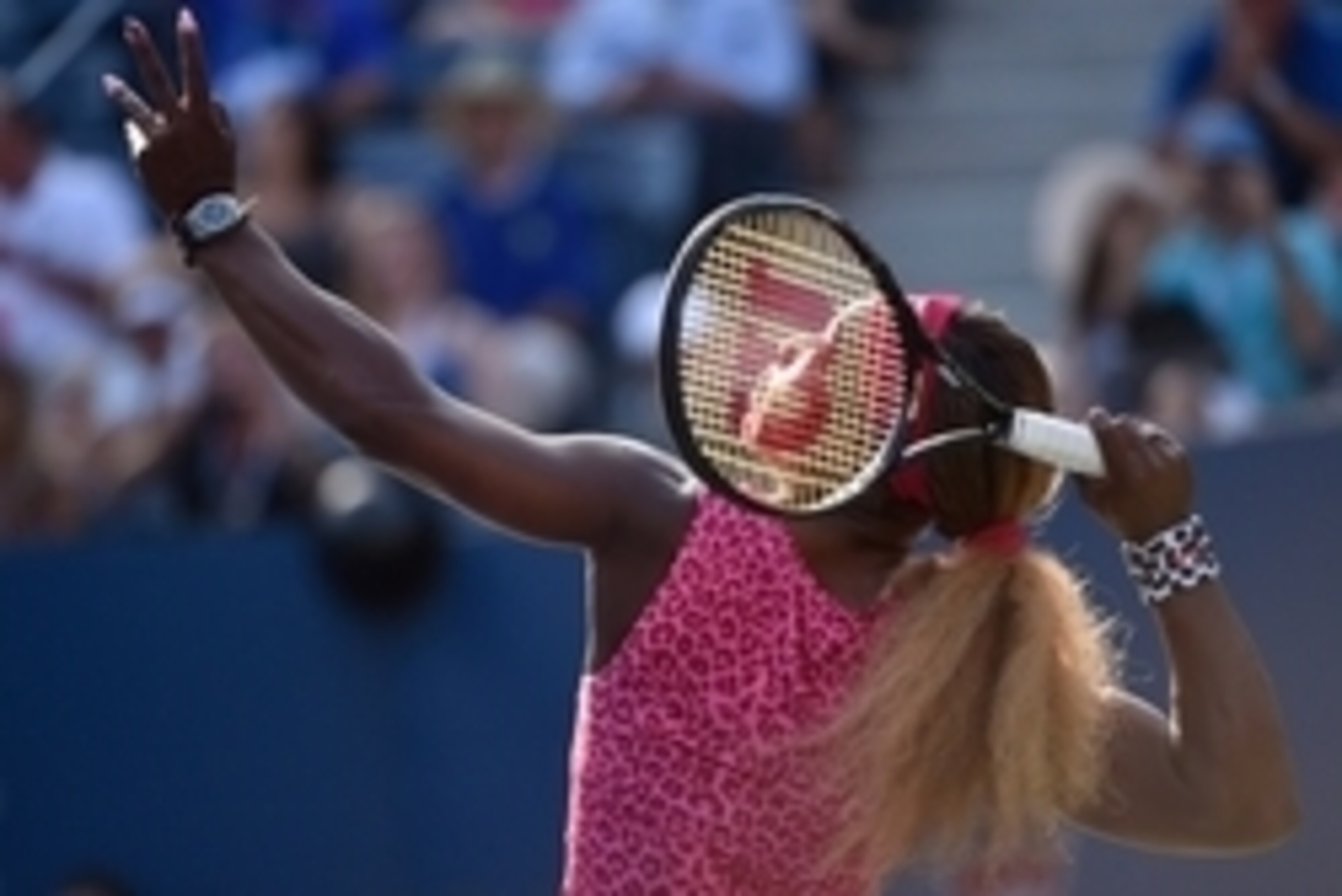 Serena Williams prepares to serve during her semifinal match at the 2014 U.S. Open.