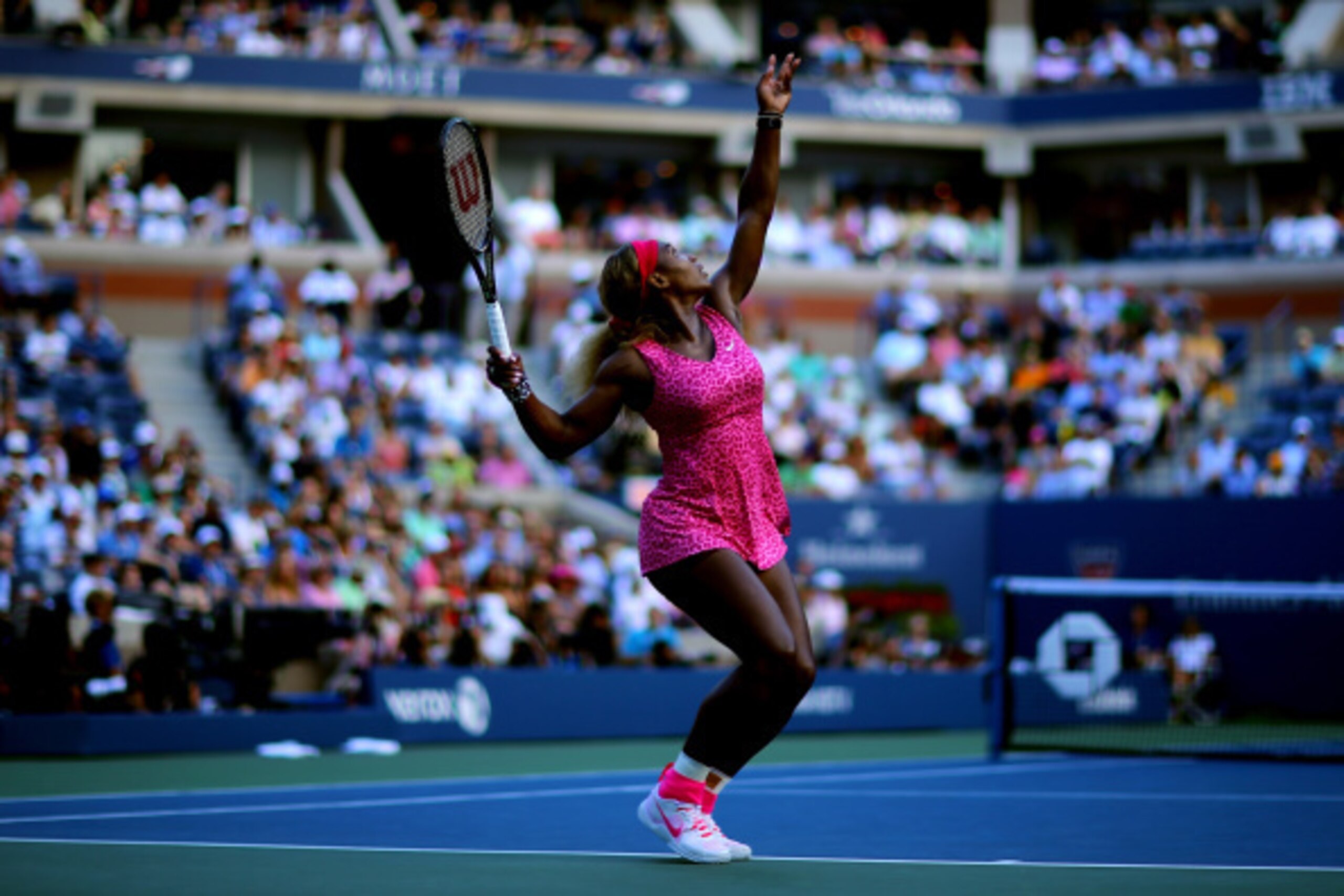 Serena Williams serves during her semifinal match at the 2014 U.S. Open.