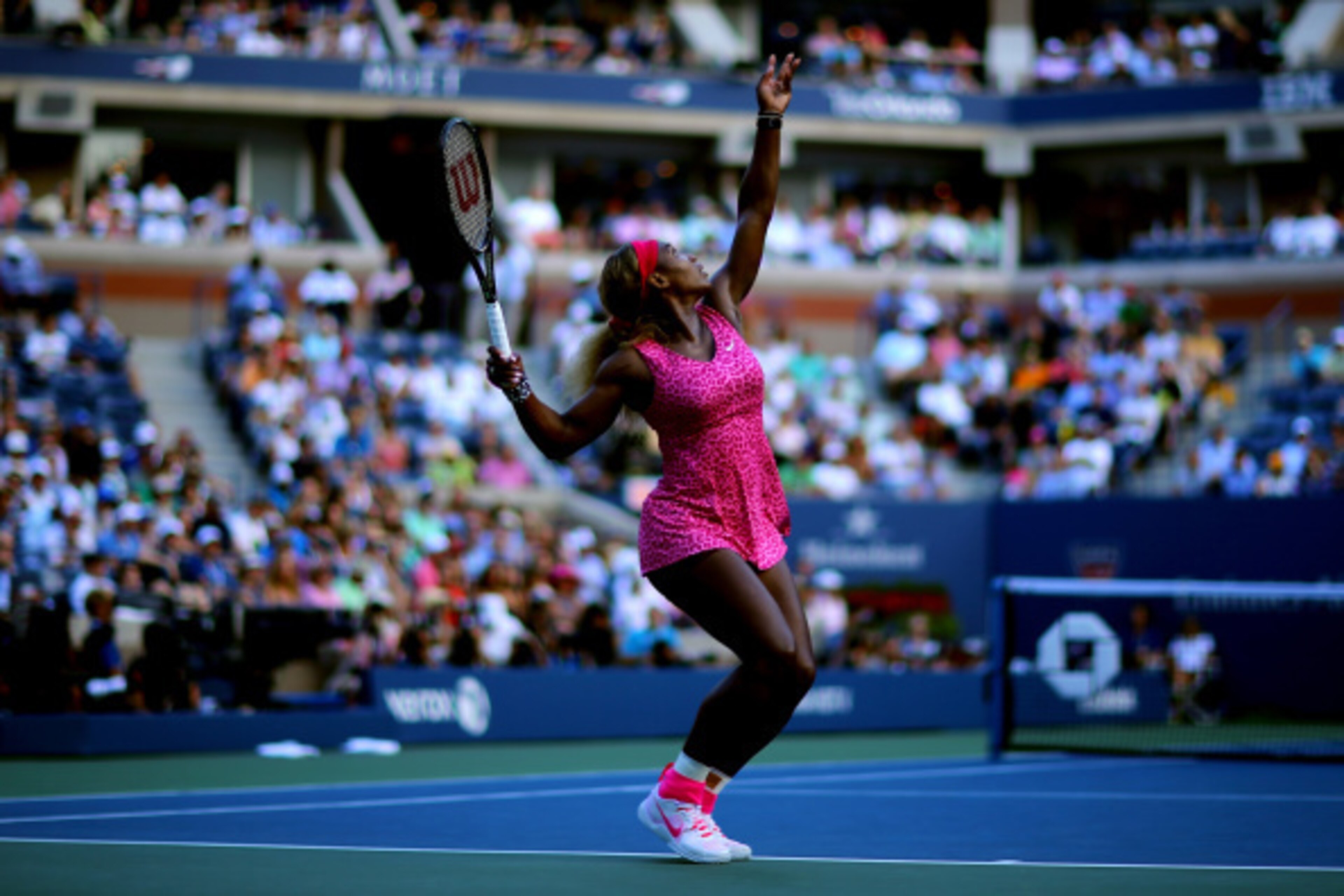 Serena Williams serves during her semifinal match at the 2014 U.S. Open.