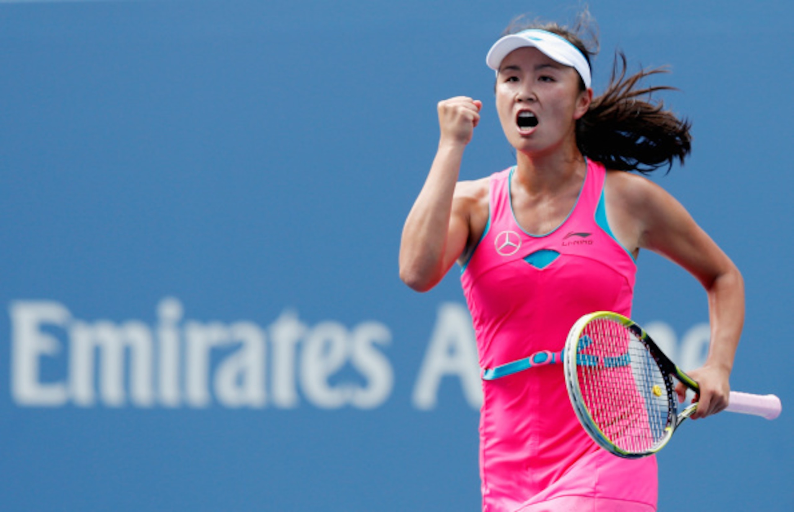Shuai Peng celebrates winning a point during her semifinal match at the 2014 U.S. Open.