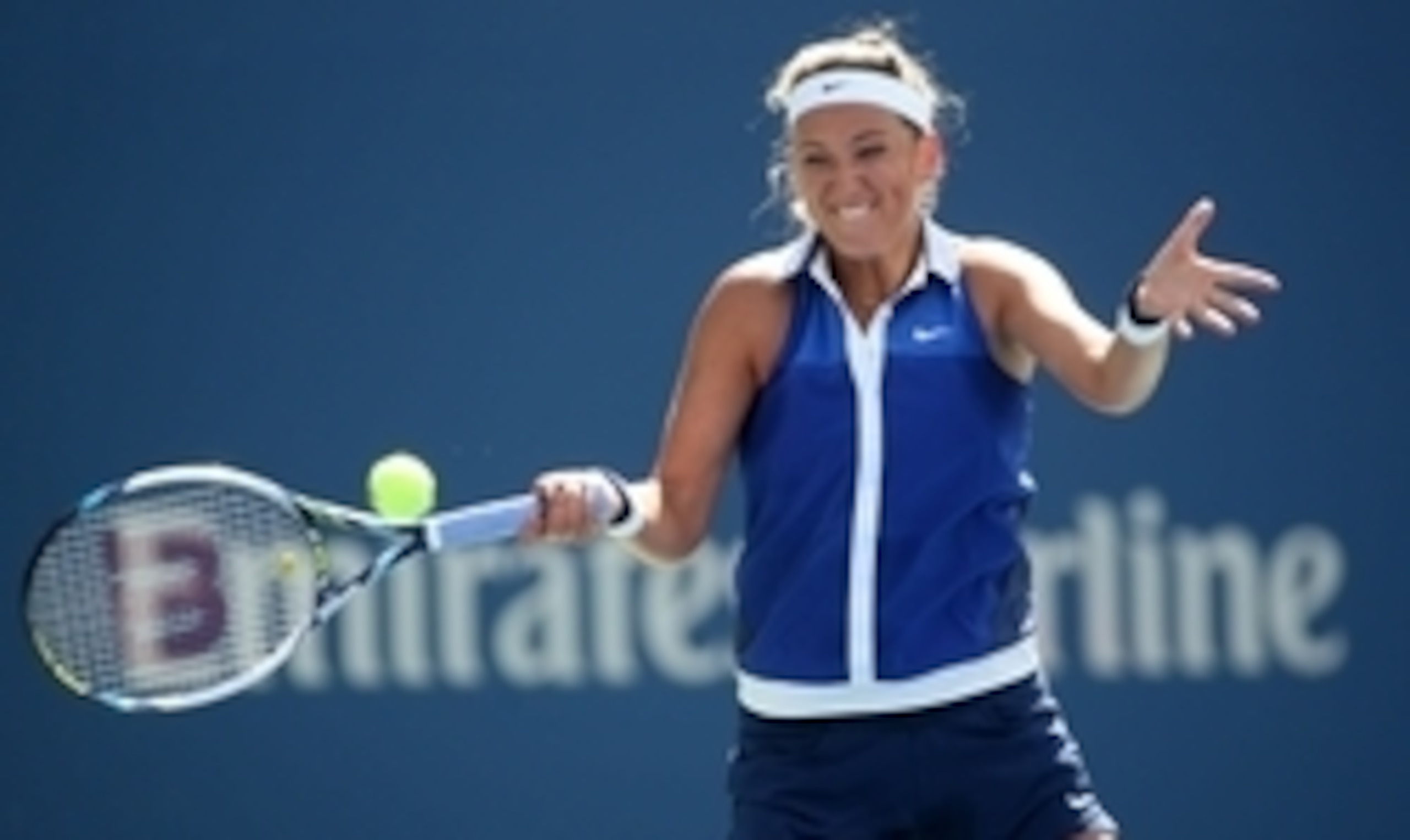 Victoria Azarenka hits a forehand during a match at the 2014 U.S. Open.
