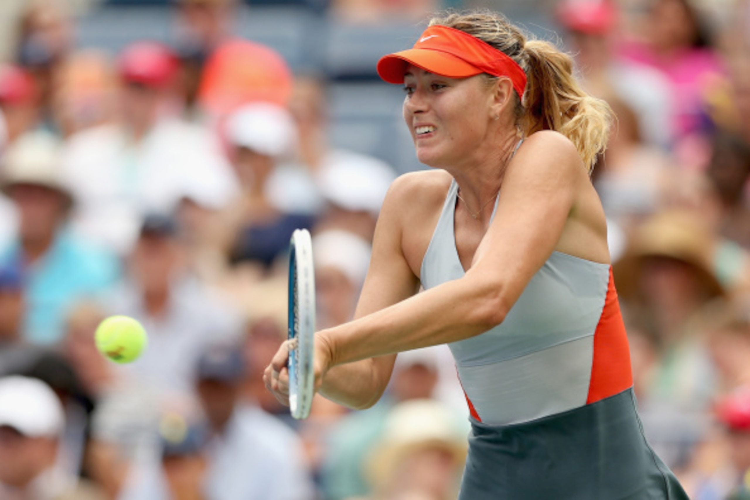Maria Sharapova volleys during a match at the 2014 U.S. Open.