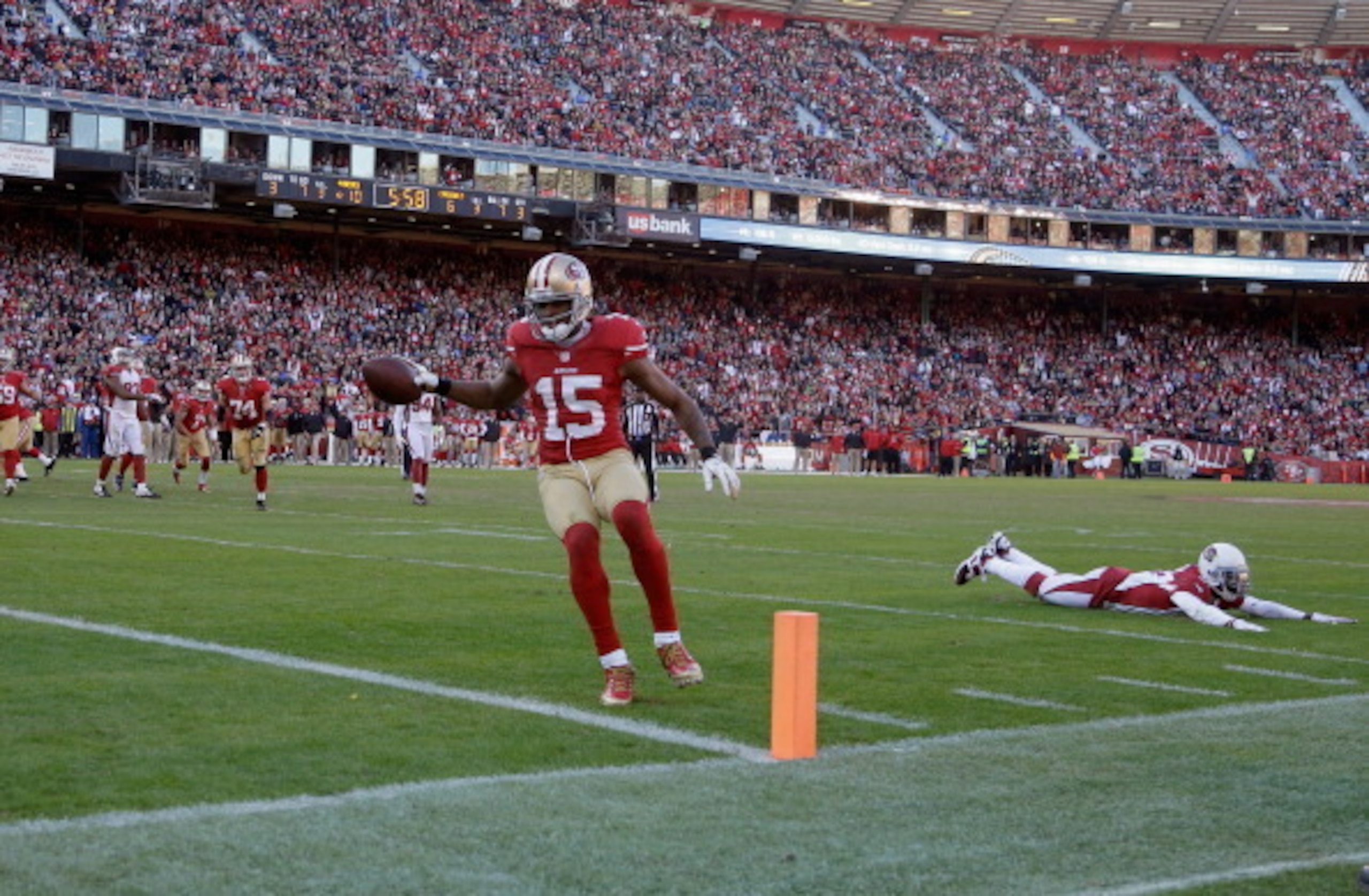 Crabtree in the end zone, Cardinal defenders on the turf—the 49ers cap off their 2014 regular season with a crucial divisional win over Arizona.