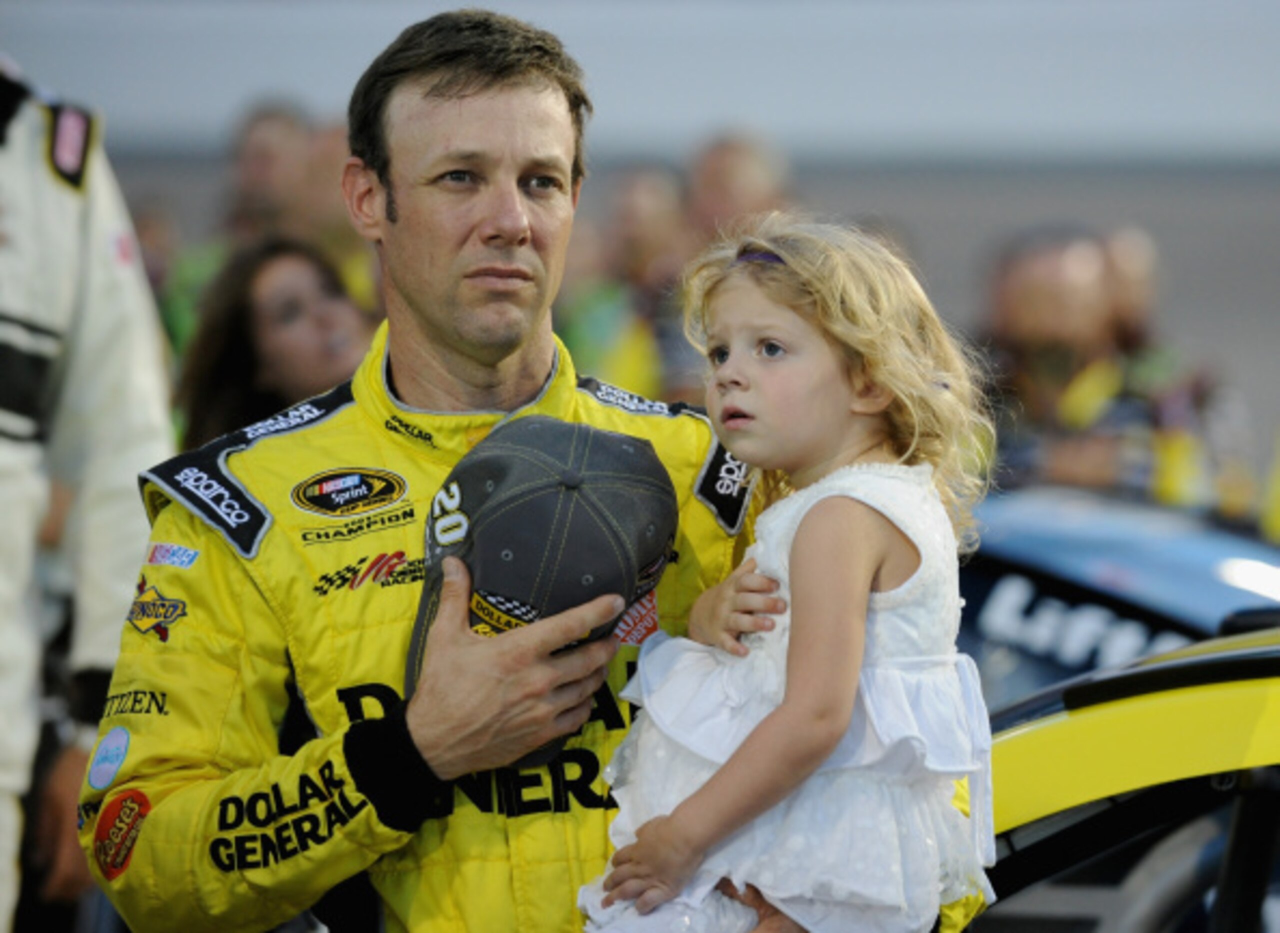 RICHMOND, VA - SEPTEMBER 06:  Matt Kenseth, driver of the #20 Dollar General Toyota, takes part in pre-race ceremonies with his daughter Grace for the NASCAR Sprint Cup Series Federated Auto Parts 400 at Richmond International Raceway on September 6, 2014