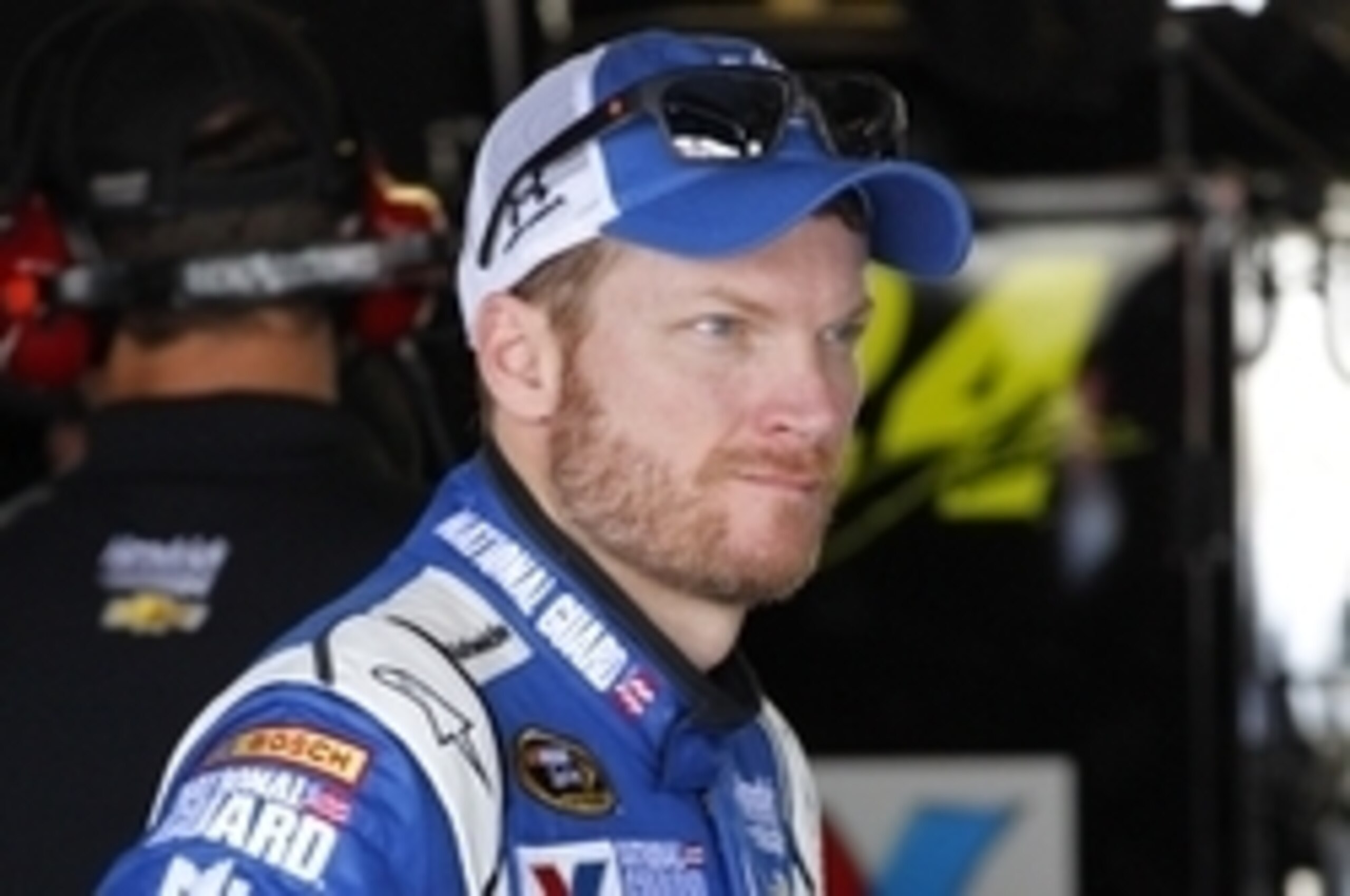 Sep 5, 2014; Richmond, VA, USA; Sprint Cup Series driver Dale Earnhardt Jr. (88) stands in the garage during practice at Richmond International Raceway. Mandatory Credit: Amber Searls-USA TODAY Sports
