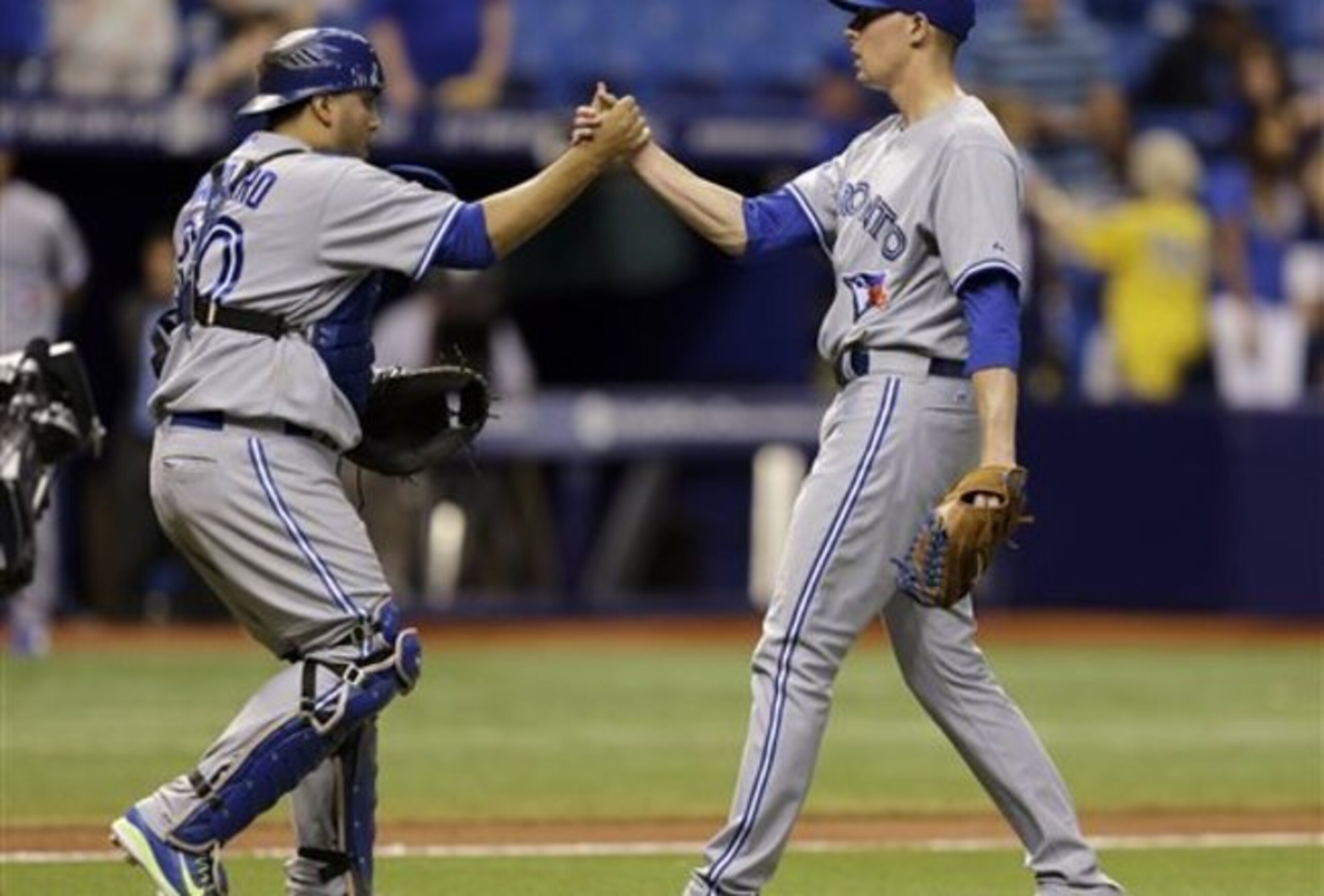 Although the struggling Casey Janssen earned the save Sunday, Aaron Sanchez (right) has been getting some opps, too.