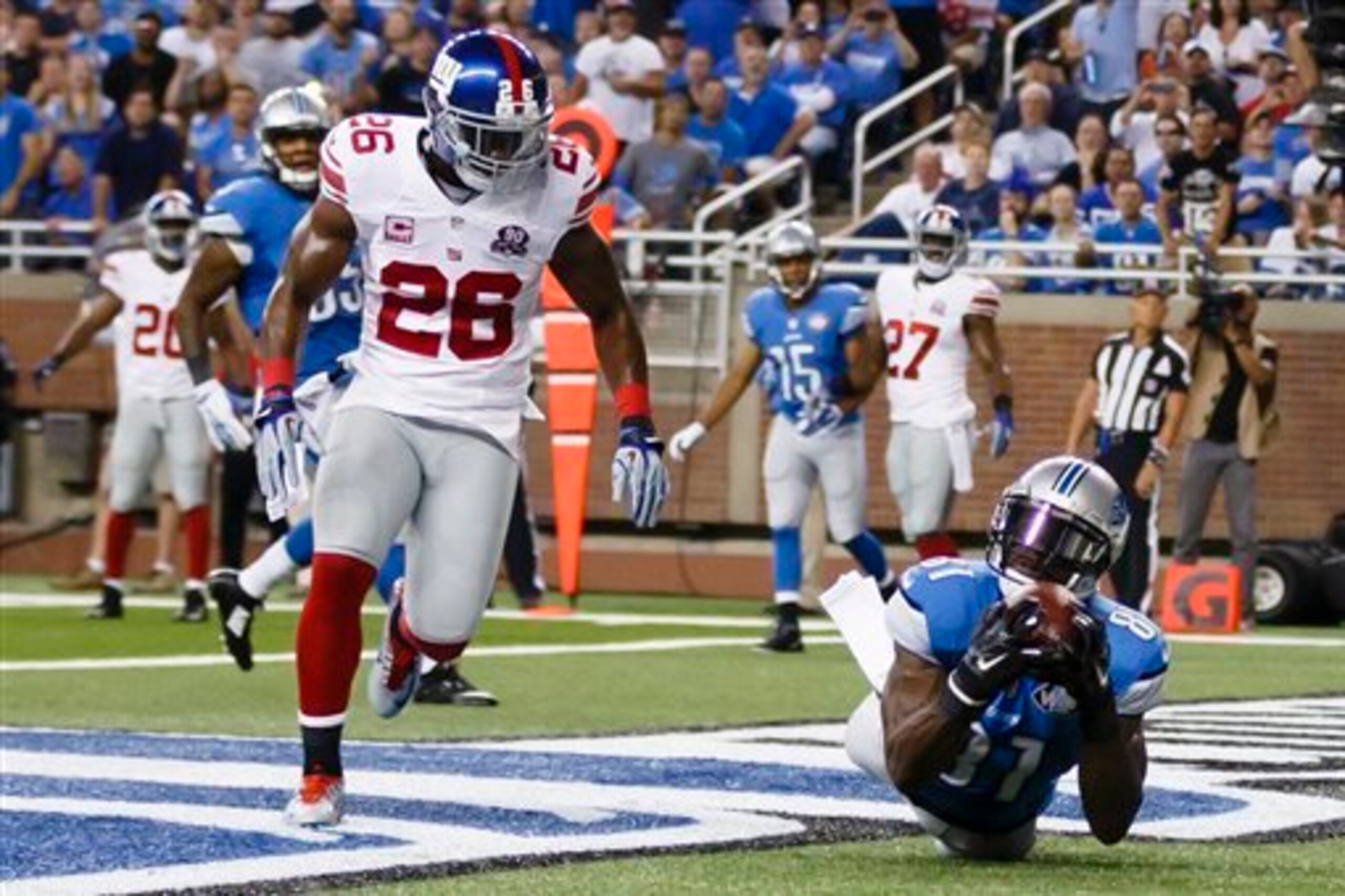 Calvin Johnson catches one of his two touchdowns.