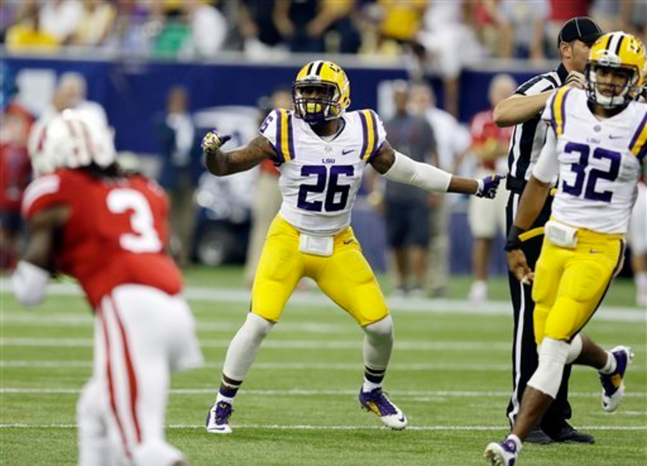 LSU safety Ronald Martin (No. 26) and cornerback Jalen Collins (No. 32)