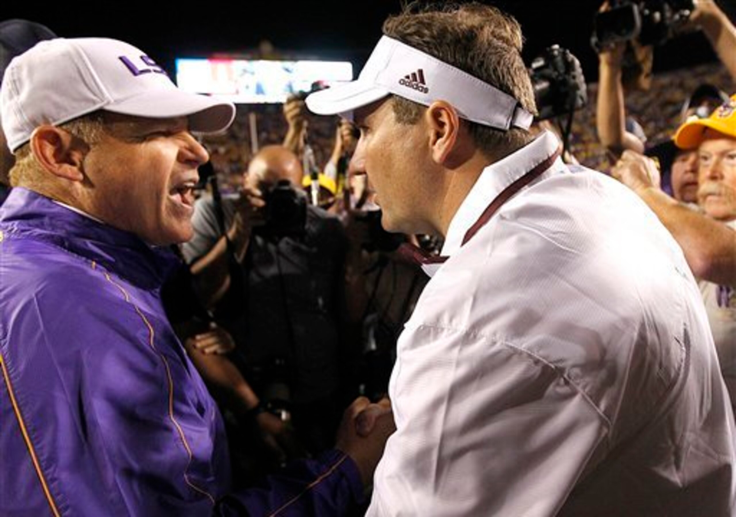 LSU head coach Les Miles (left) and Mississippi State head coach Dan Mullen (right)