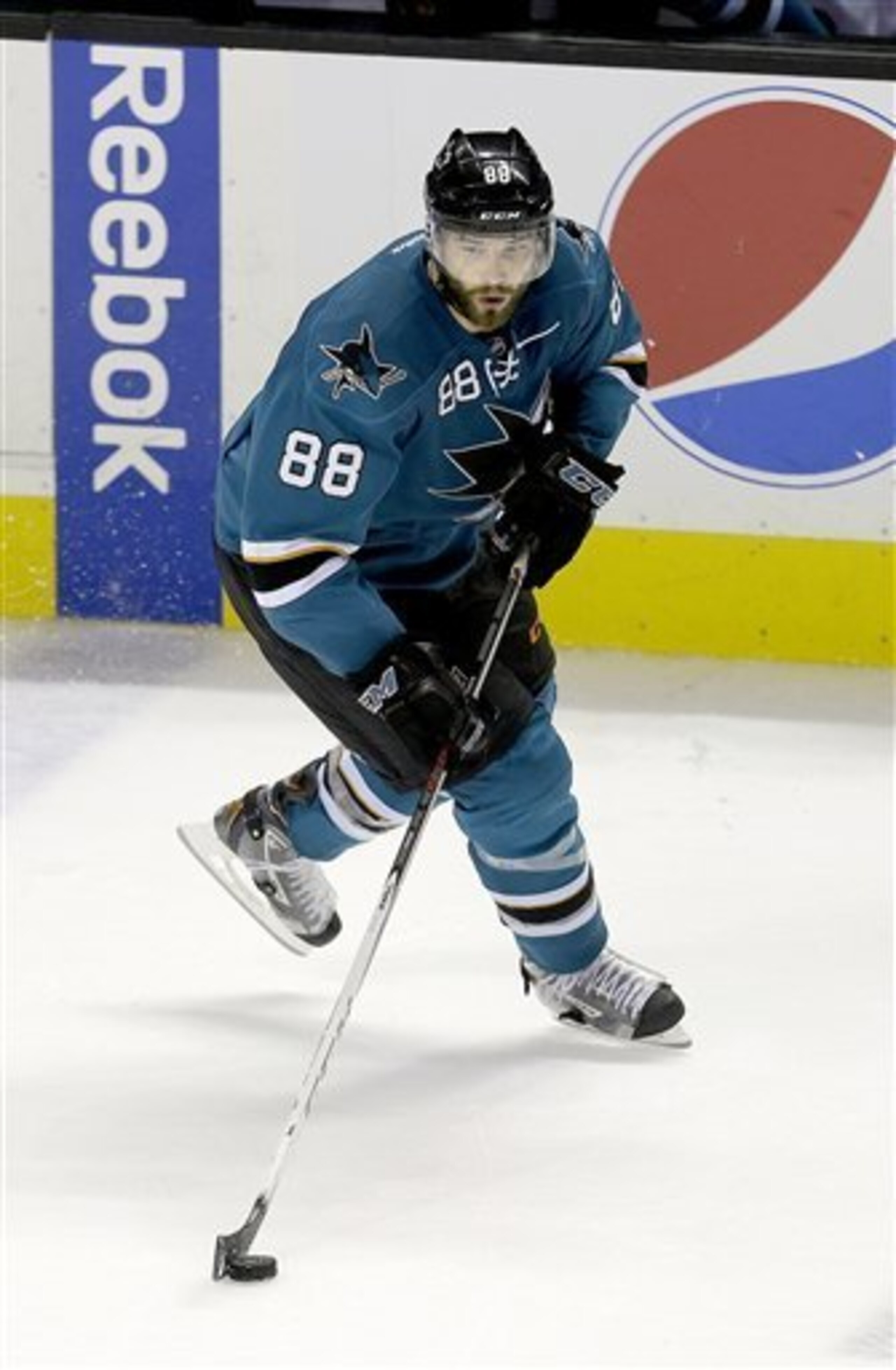 Brent Burns is moving back to defense this season.