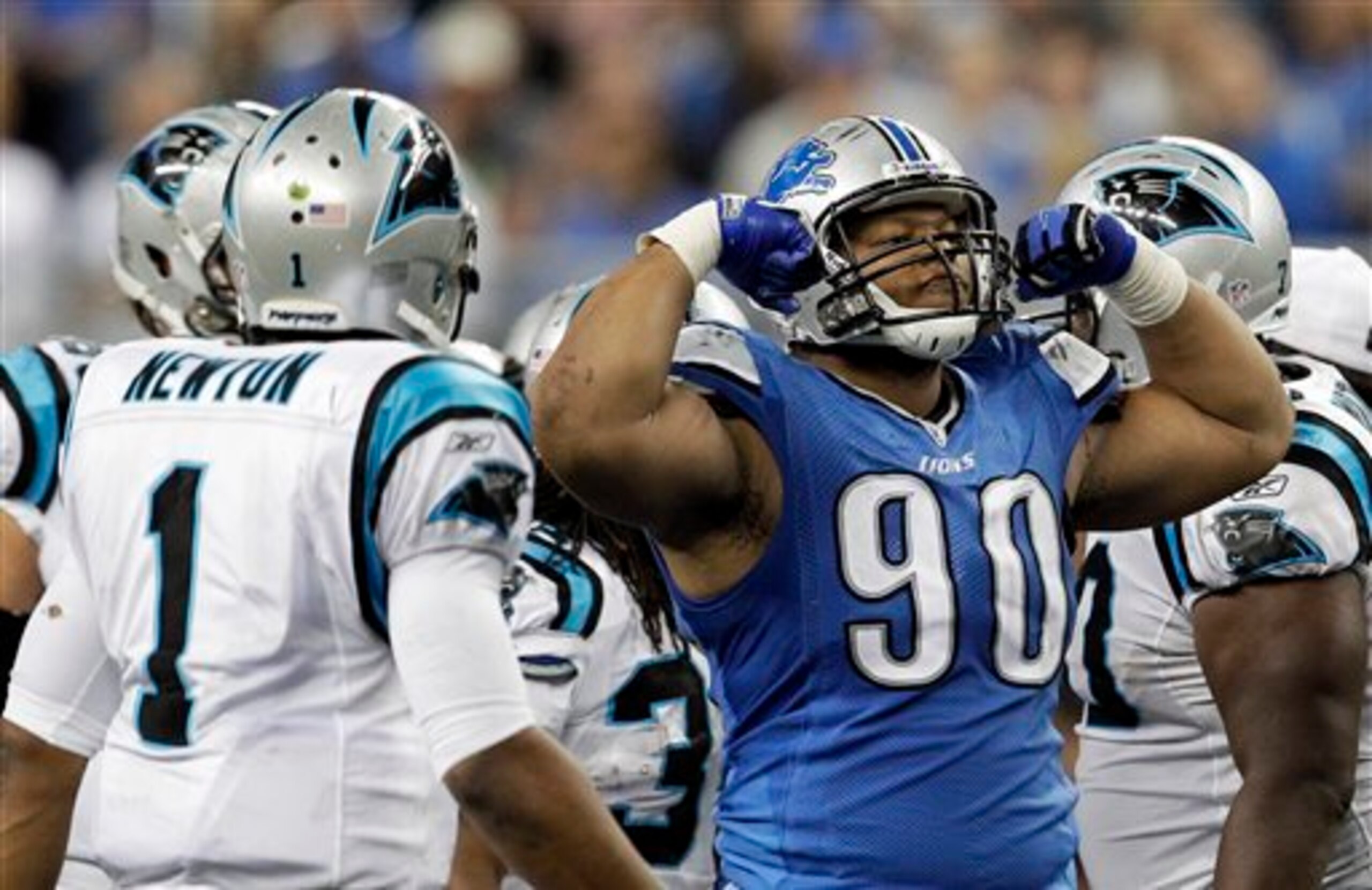 Lions DT Ndamukong Suh and Panthers QB Cam Newton