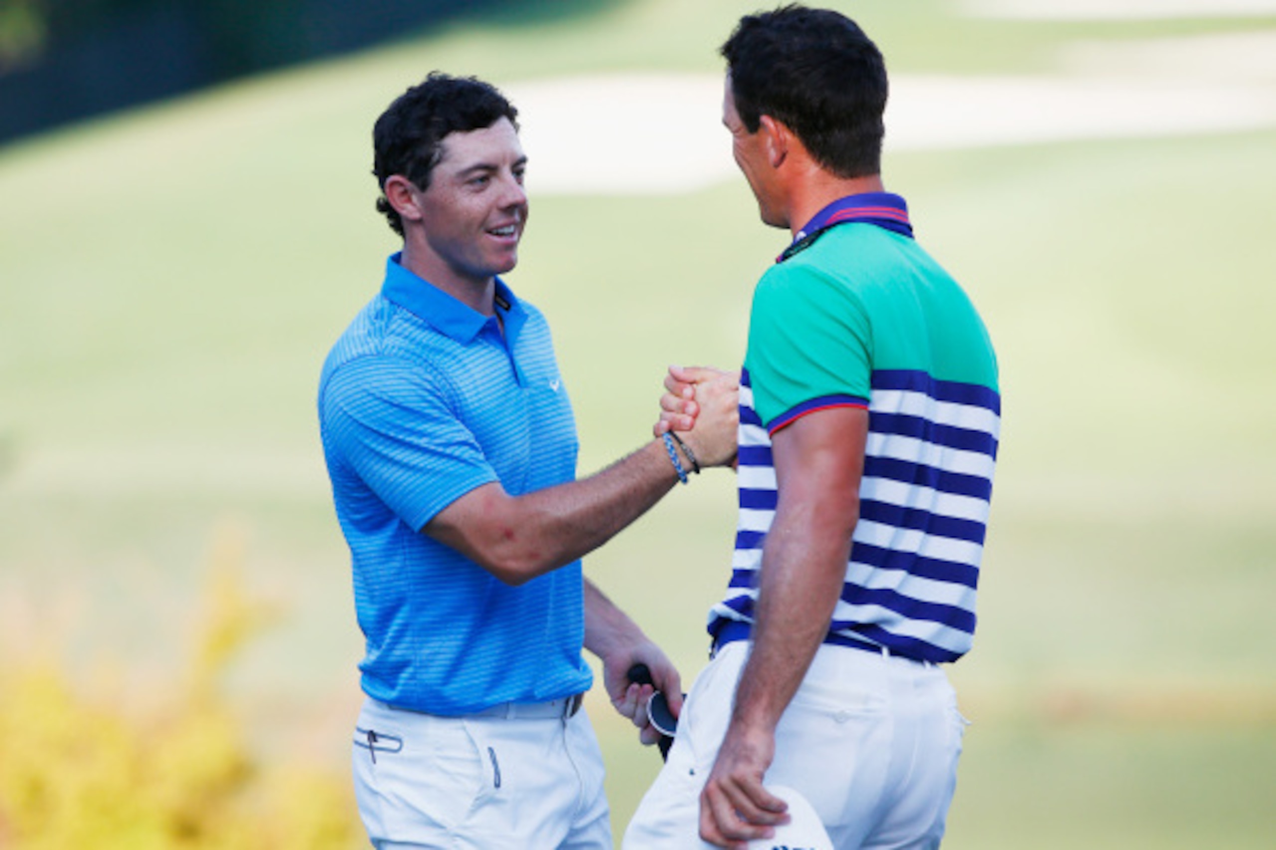 These two will be paired again Sunday, playing for the biggest prize in golf. These two will be paired again Sunday, playing for the biggest prize in golf.
