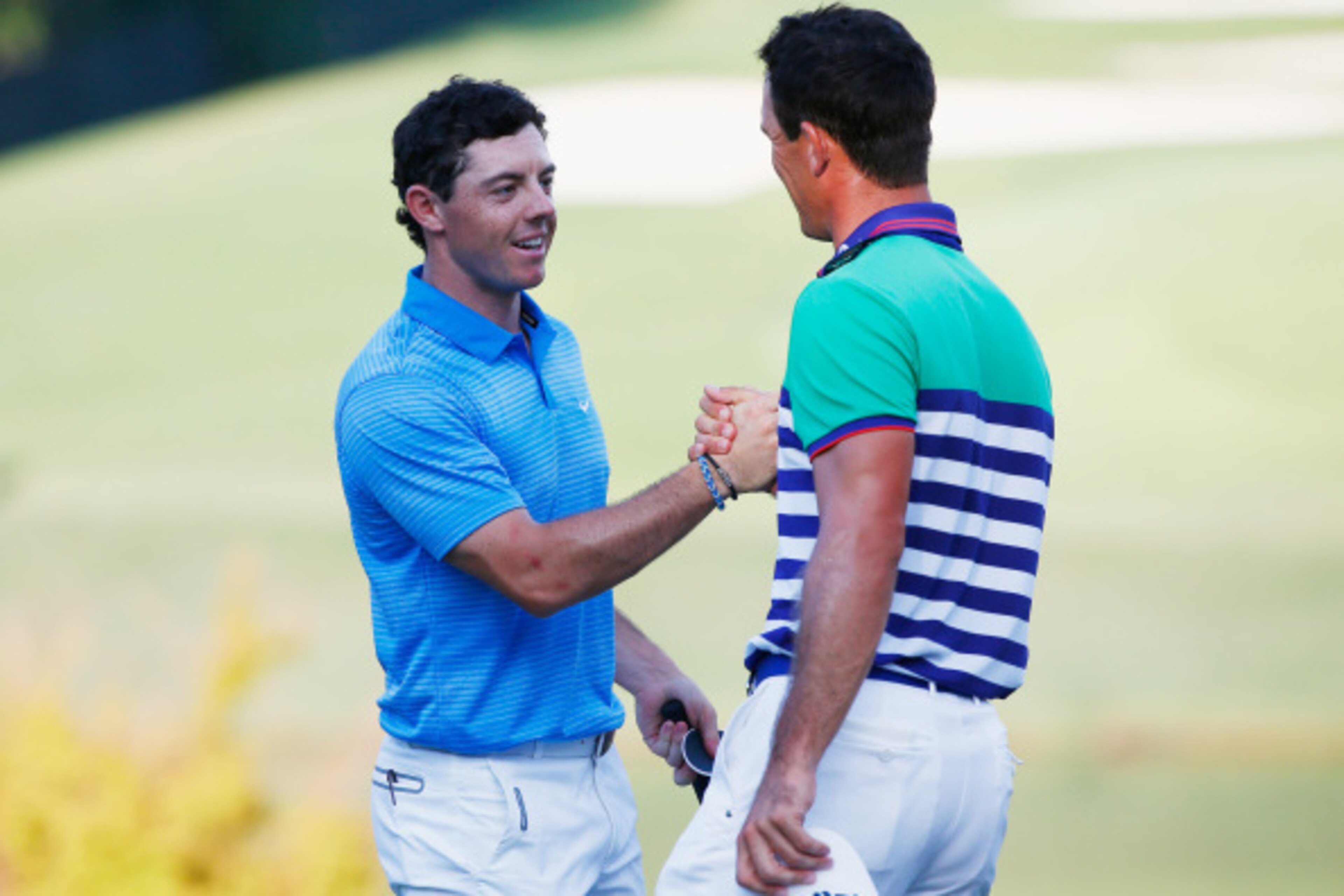 These two will be paired again Sunday, playing for the biggest prize in golf.