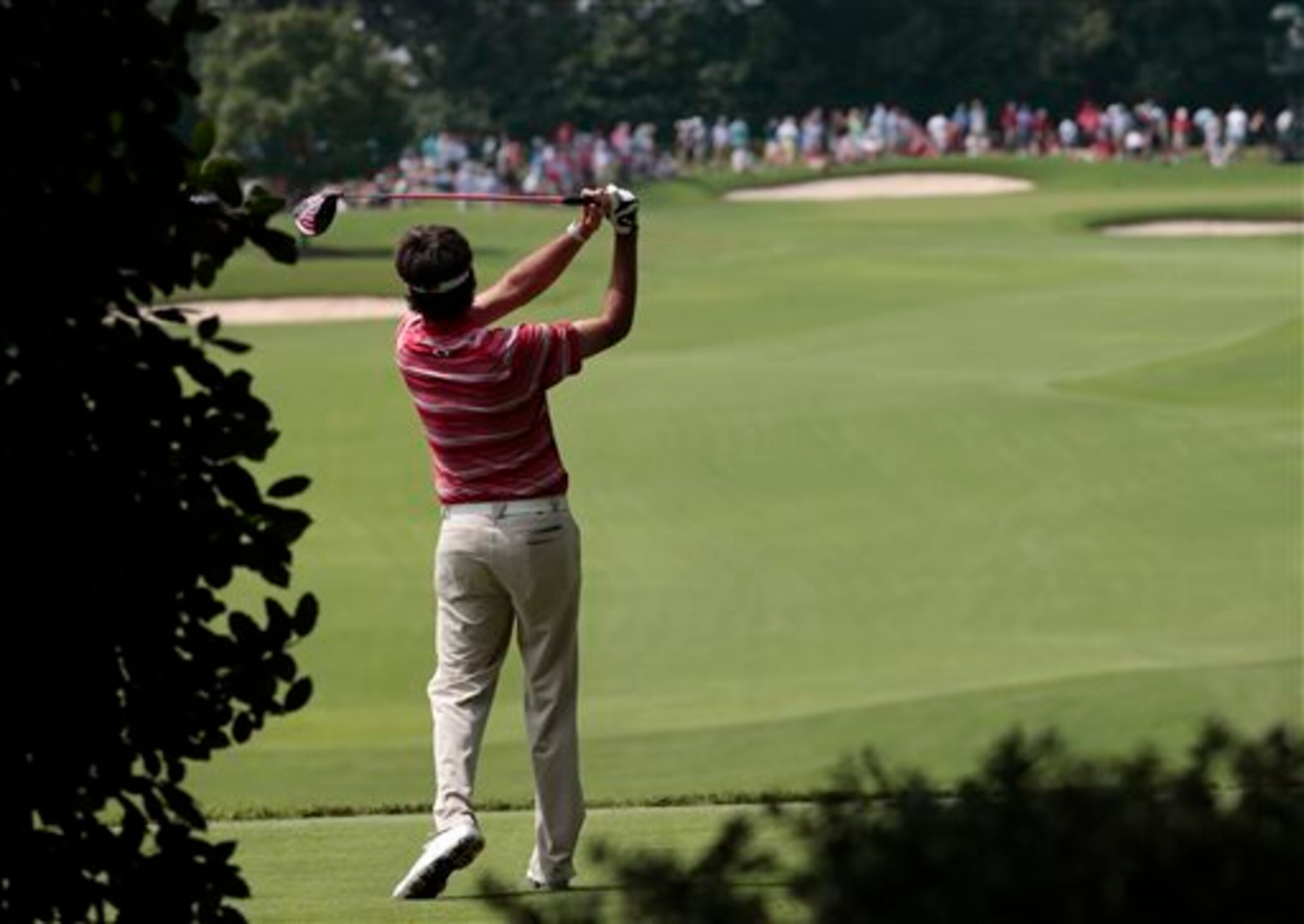 Bubba Watson fires with the driver, which has been somewhat wild this week. Bubba Watson fires with the driver, which has been somewhat wild this week.