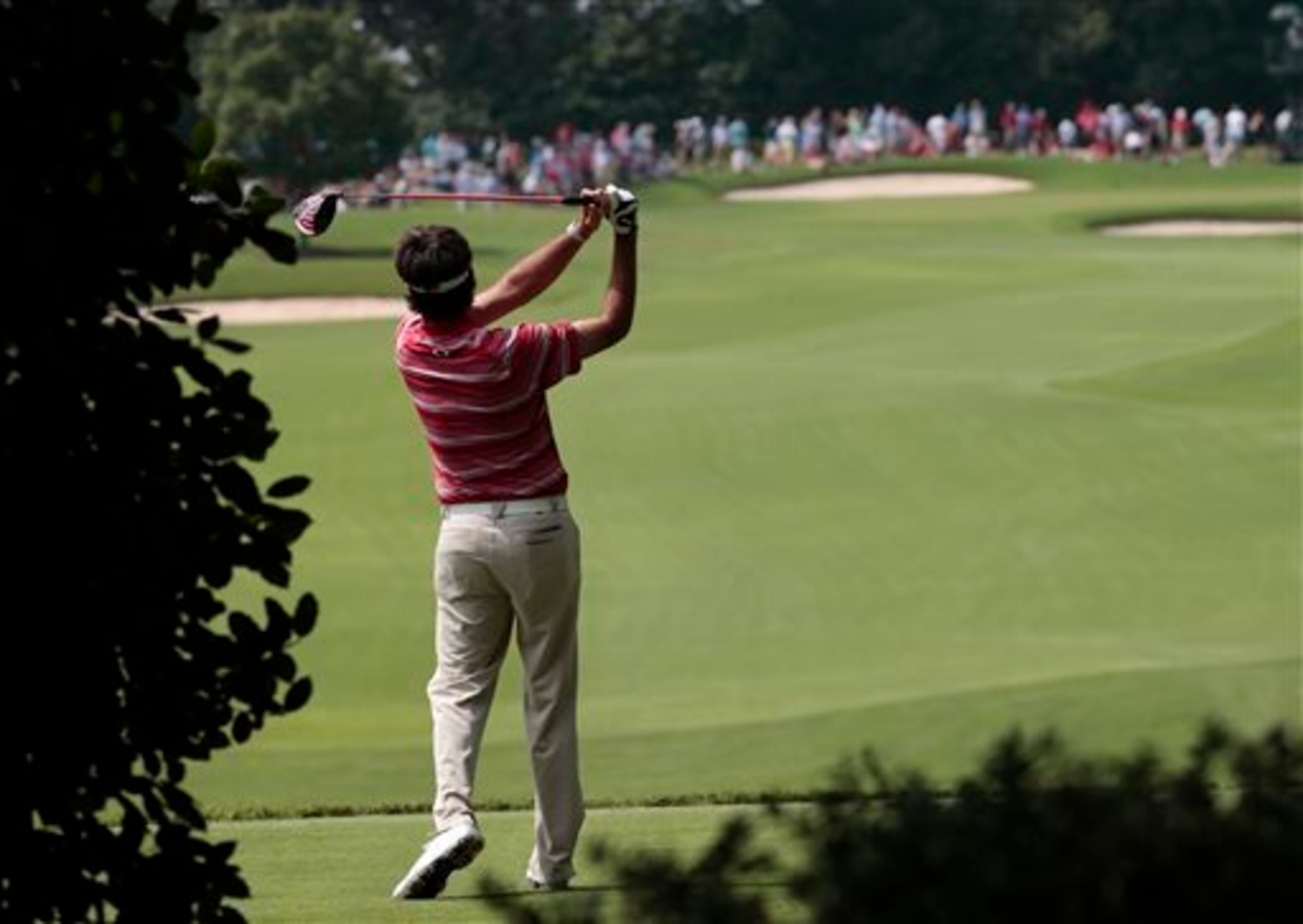 Bubba Watson fires with the driver, which has been somewhat wild this week.