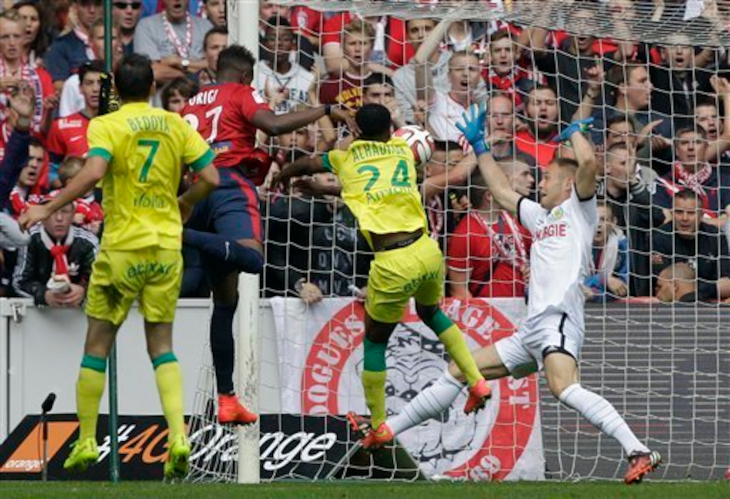 Origi heads in Lille's opener.