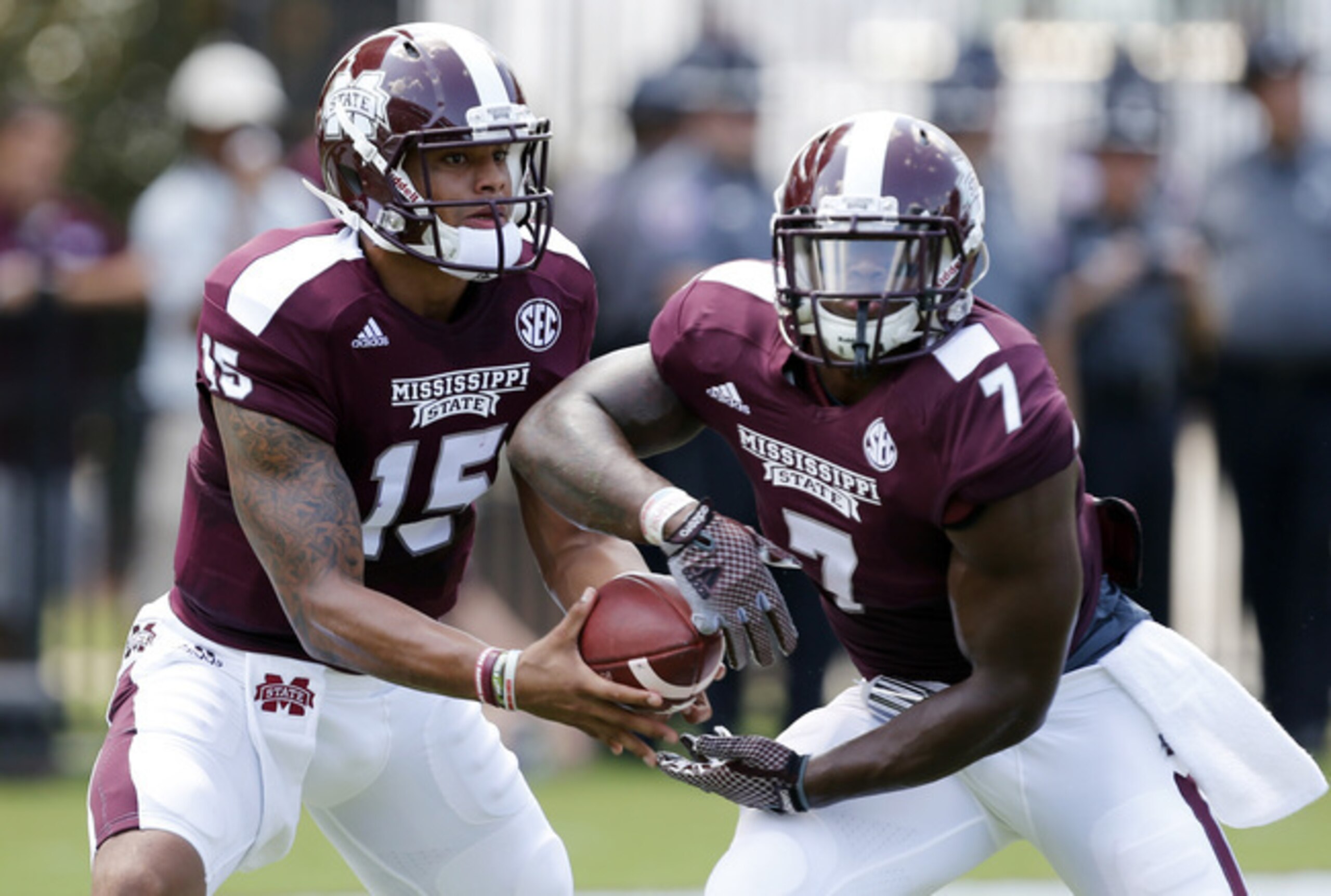 Mississippi State quarterback Dak Prescott (left) and running back Nick Griffin (right). Mississippi State quarterback Dak Prescott (left) and running back Nick Griffin (right).