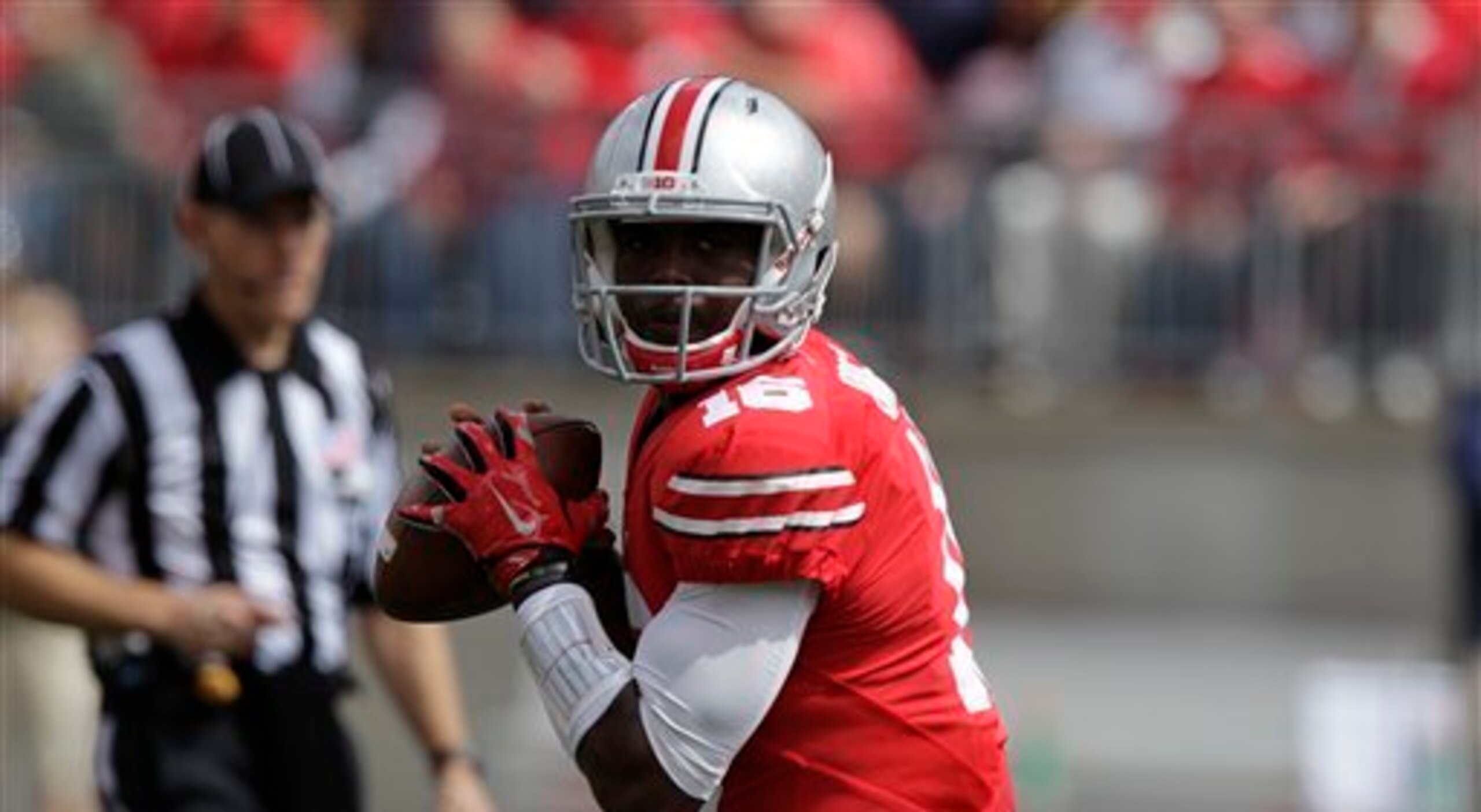 Thrown into the fire, J.T. Barrett has responded as Ohio State's quarterback.