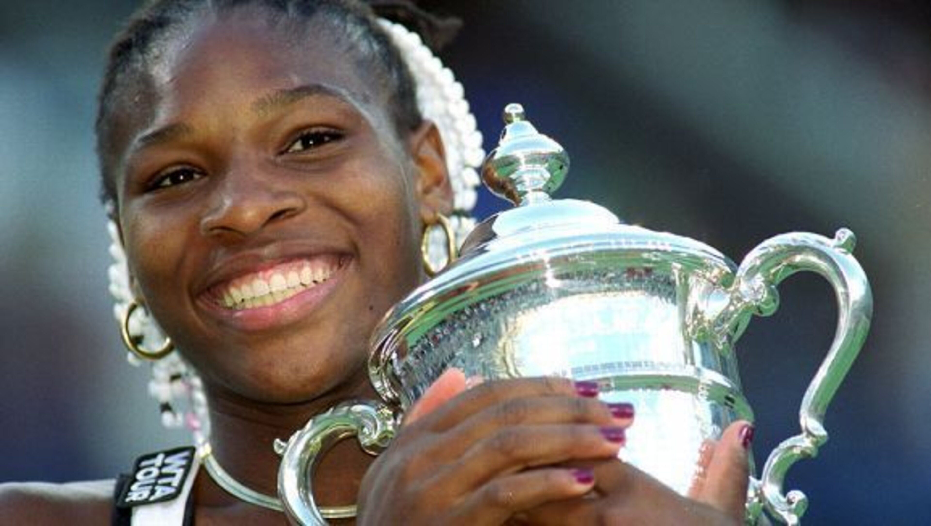 Serena with her first title, the U.S. Open, in 1999 Serena with her first title, the U.S. Open, in 1999