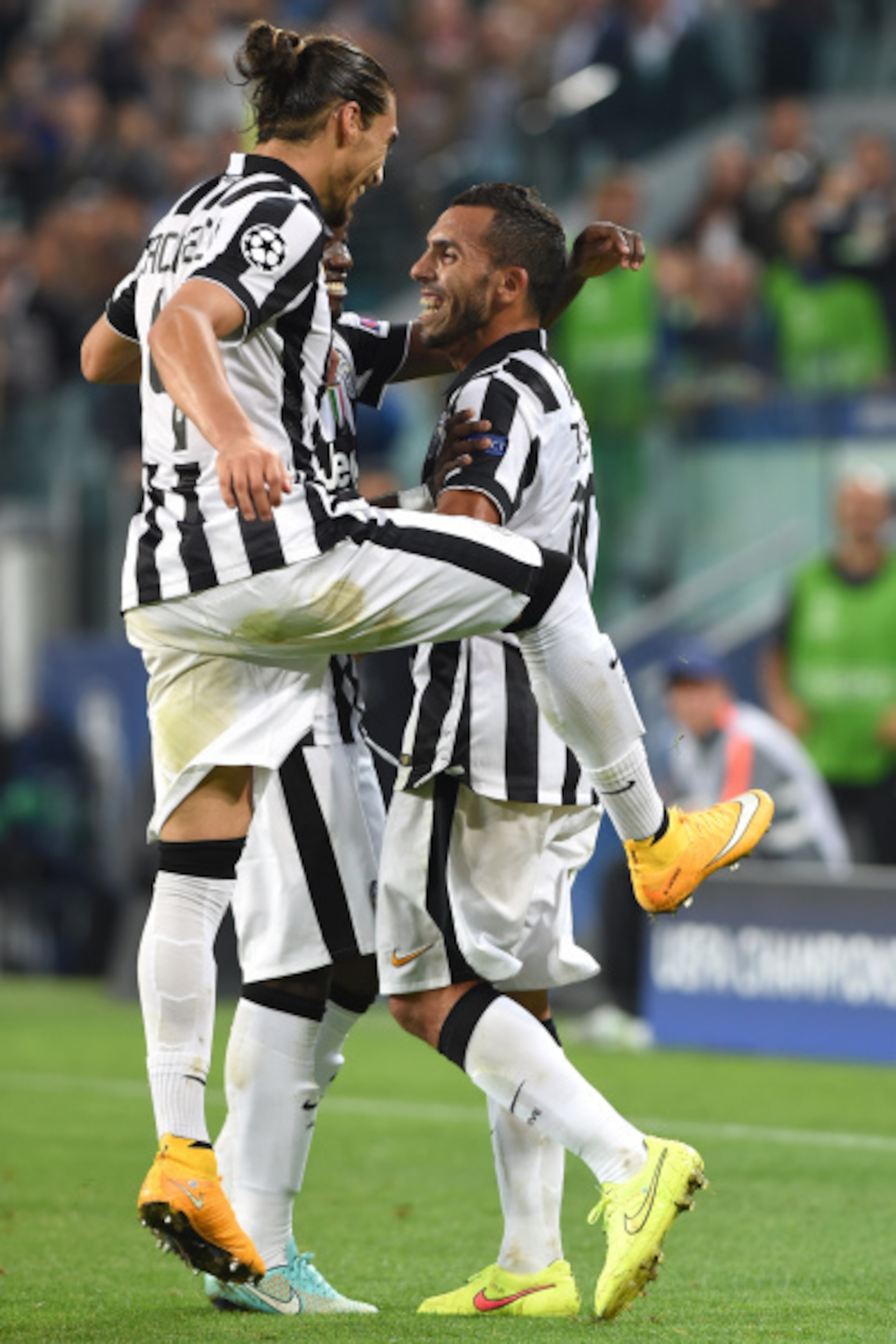 Caceres (left) and Tevez (right) were the best players on the field in Juve's Champions League win.