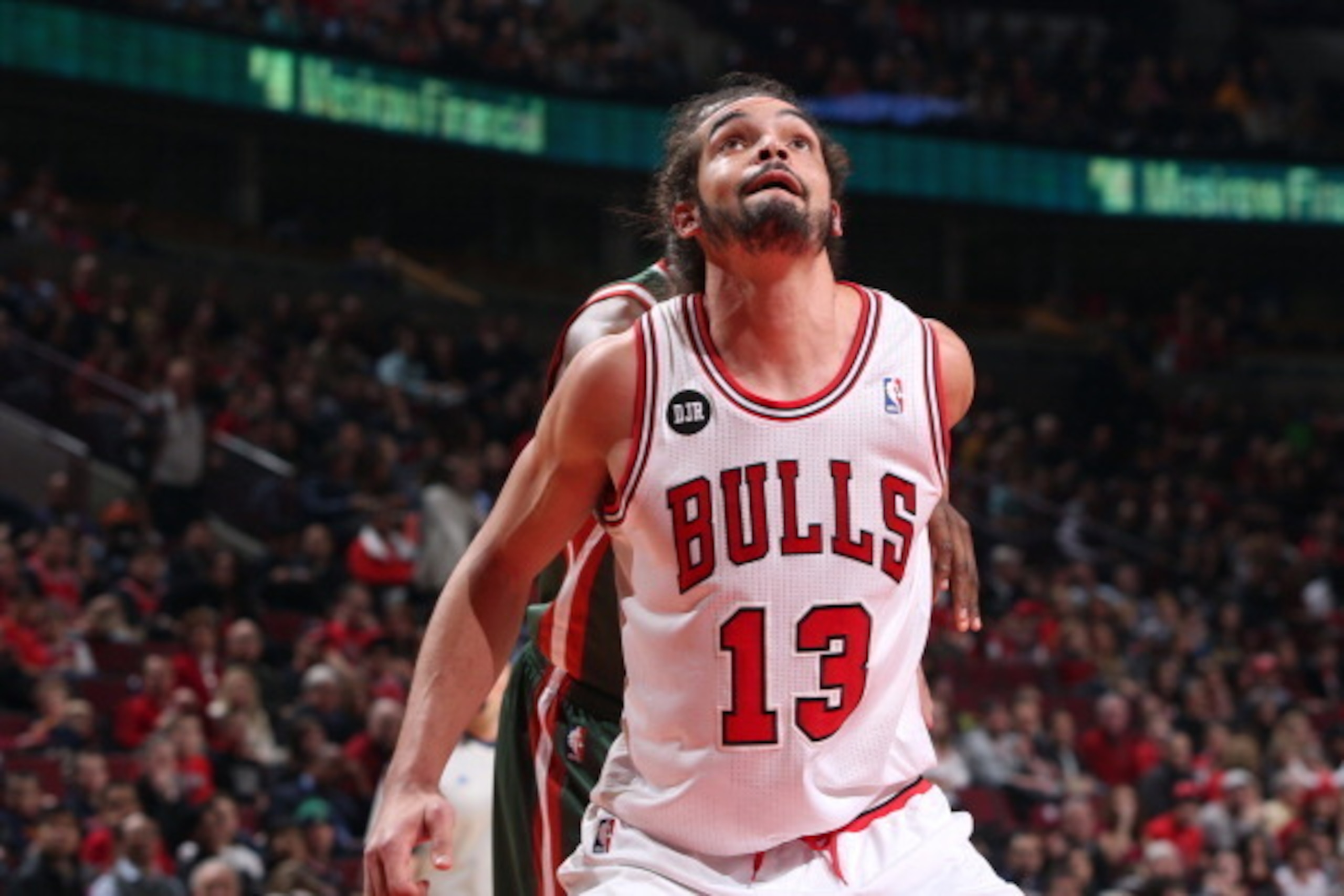 Noah boxes out for rebound.