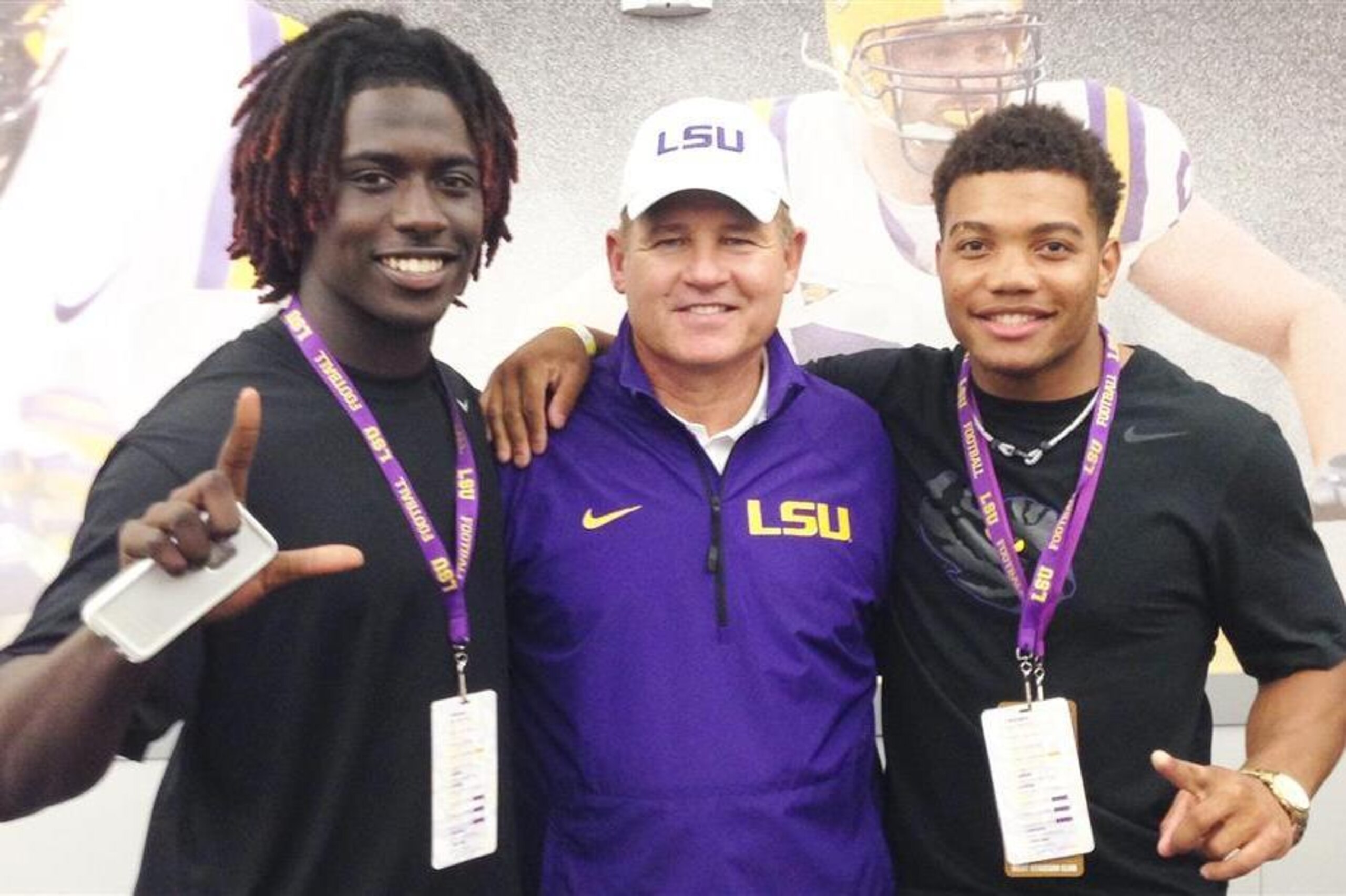 LSU 2017 commit Dylan Moses (left), LSU head coach Les Miles (center) and 2015 commit Derrius Guice (right)