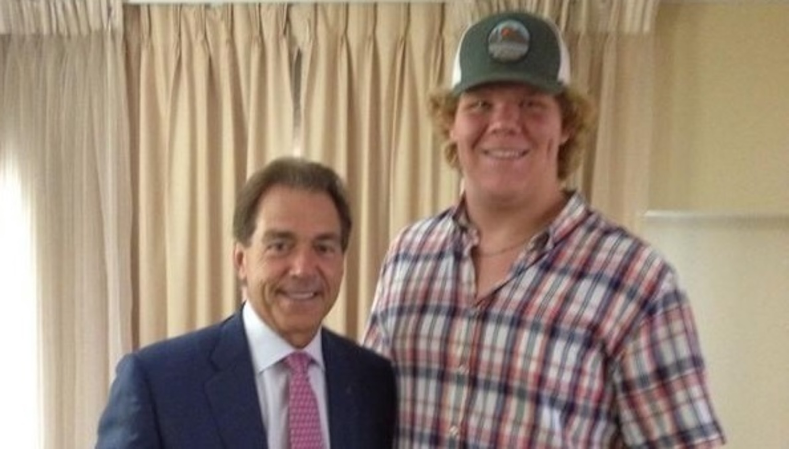 Alabama head coach Nick Saban (left) and 2015 offensive tackle prospect Matt Womack (right)