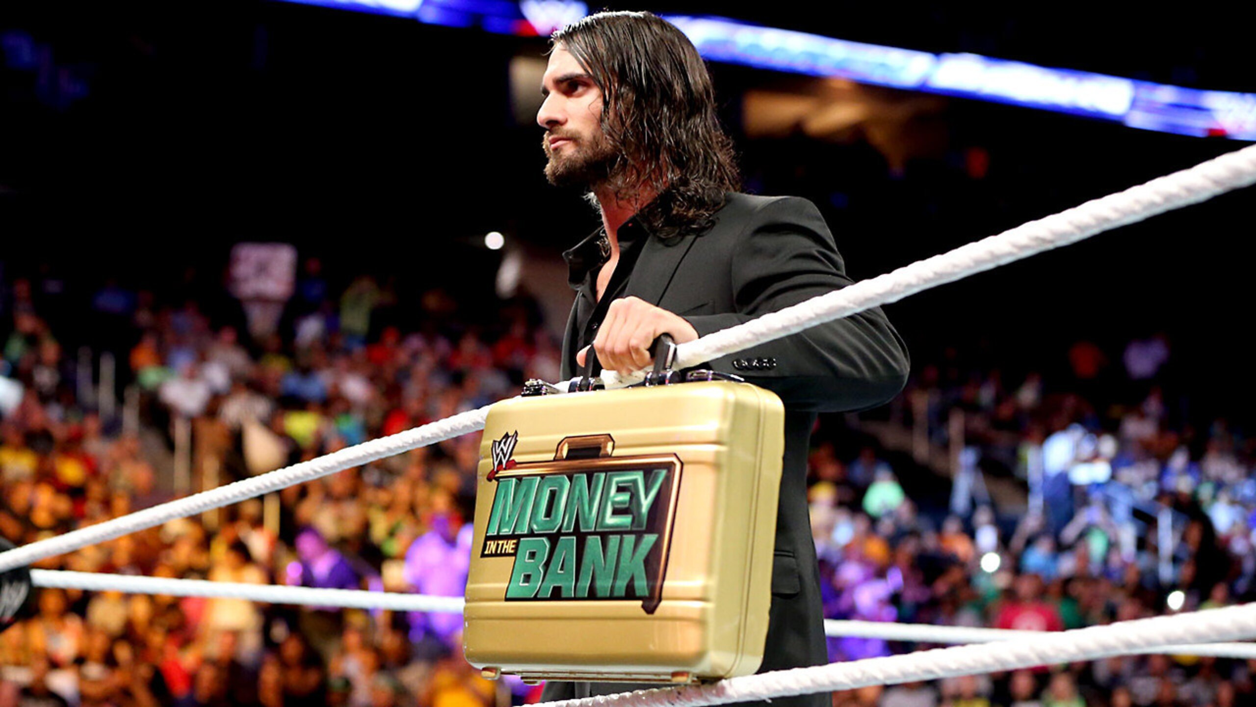 Seth Rollins with his Money in the Bank briefcase in hand.