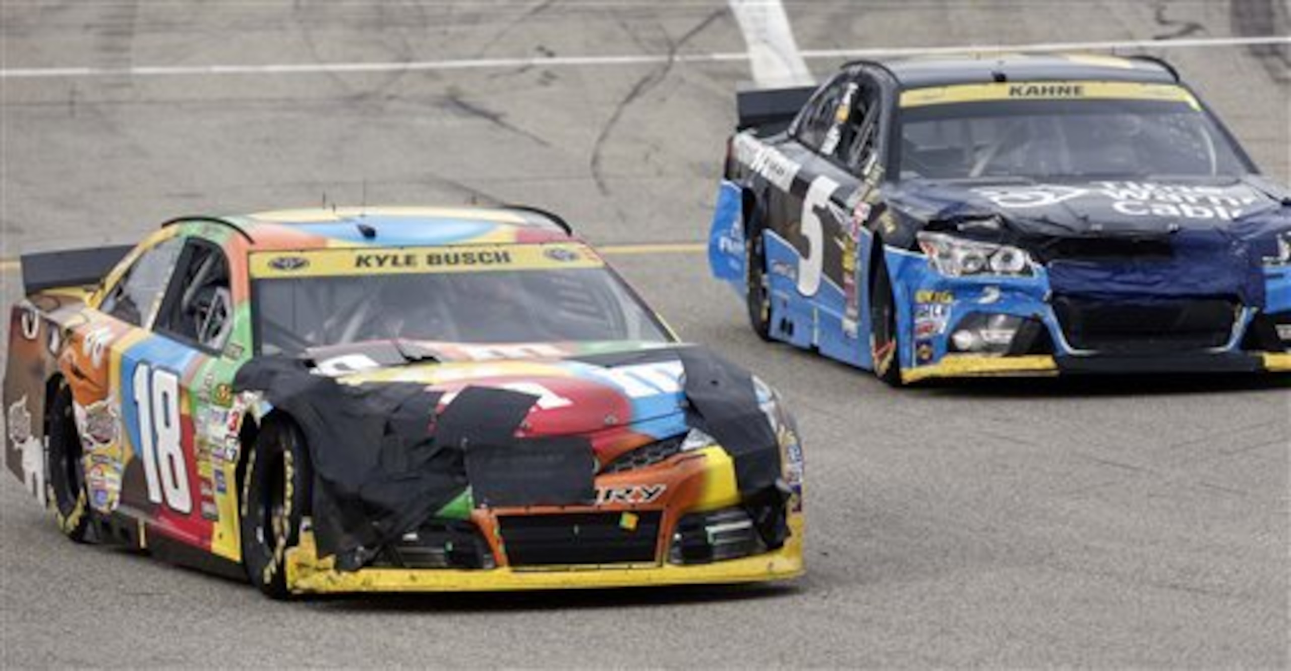 Kyle Busch's damaged Toyota Camry (left)