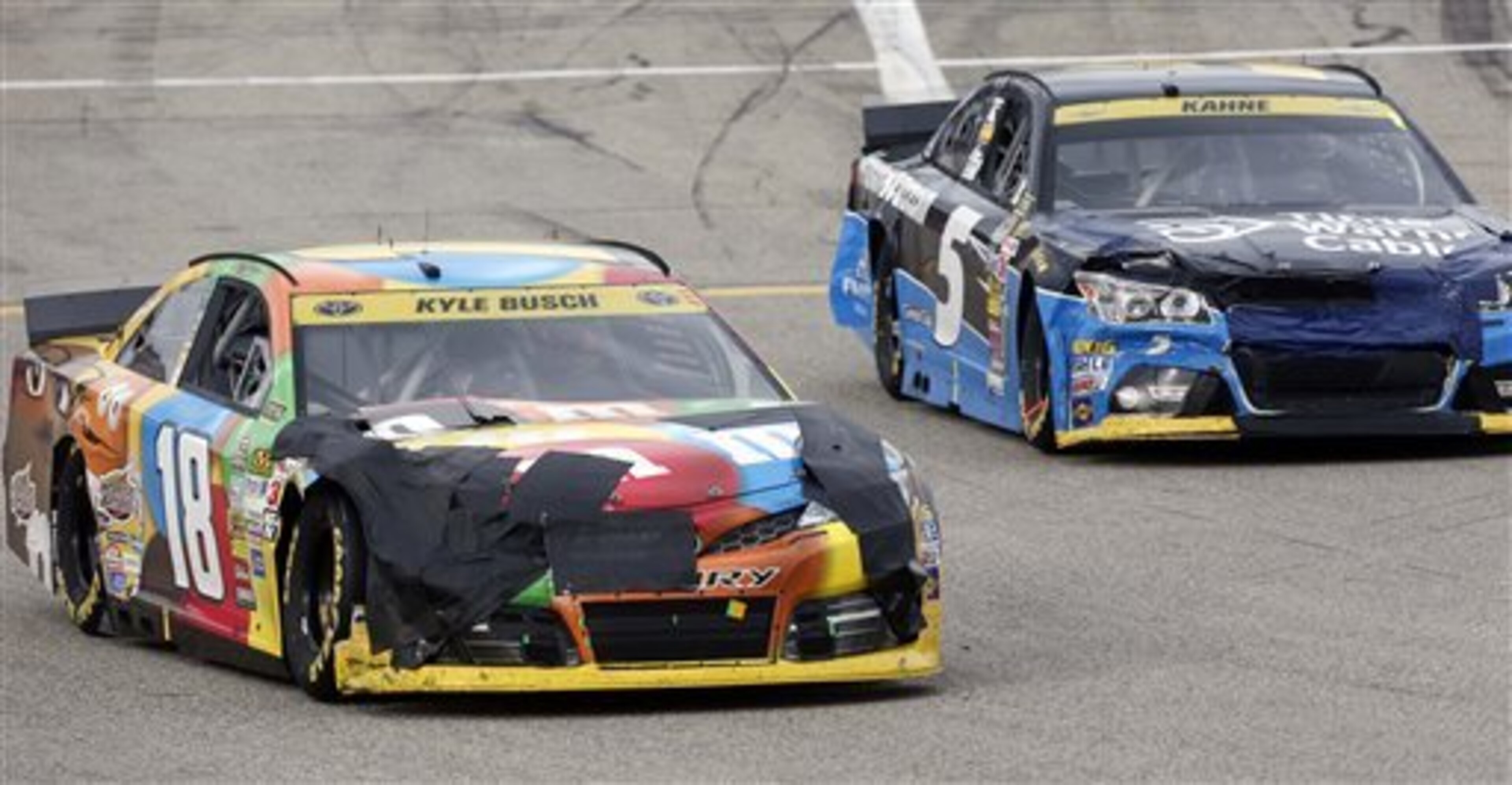 Kyle Busch's damaged Toyota Camry (left)