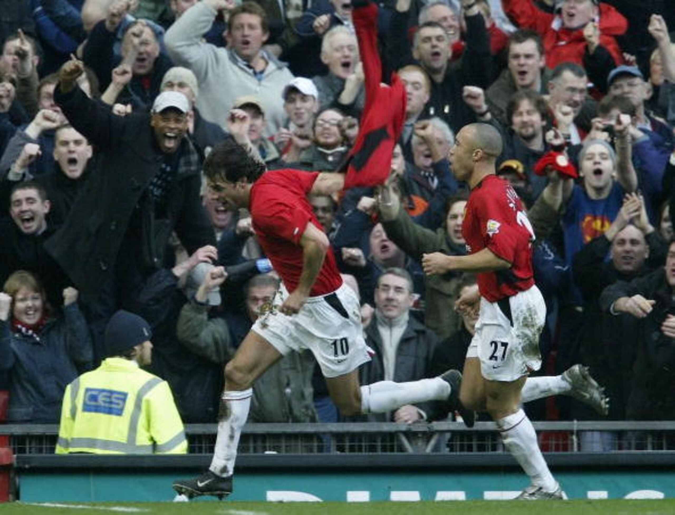 Van Nistelrooy wheels away after scoring yet another goal