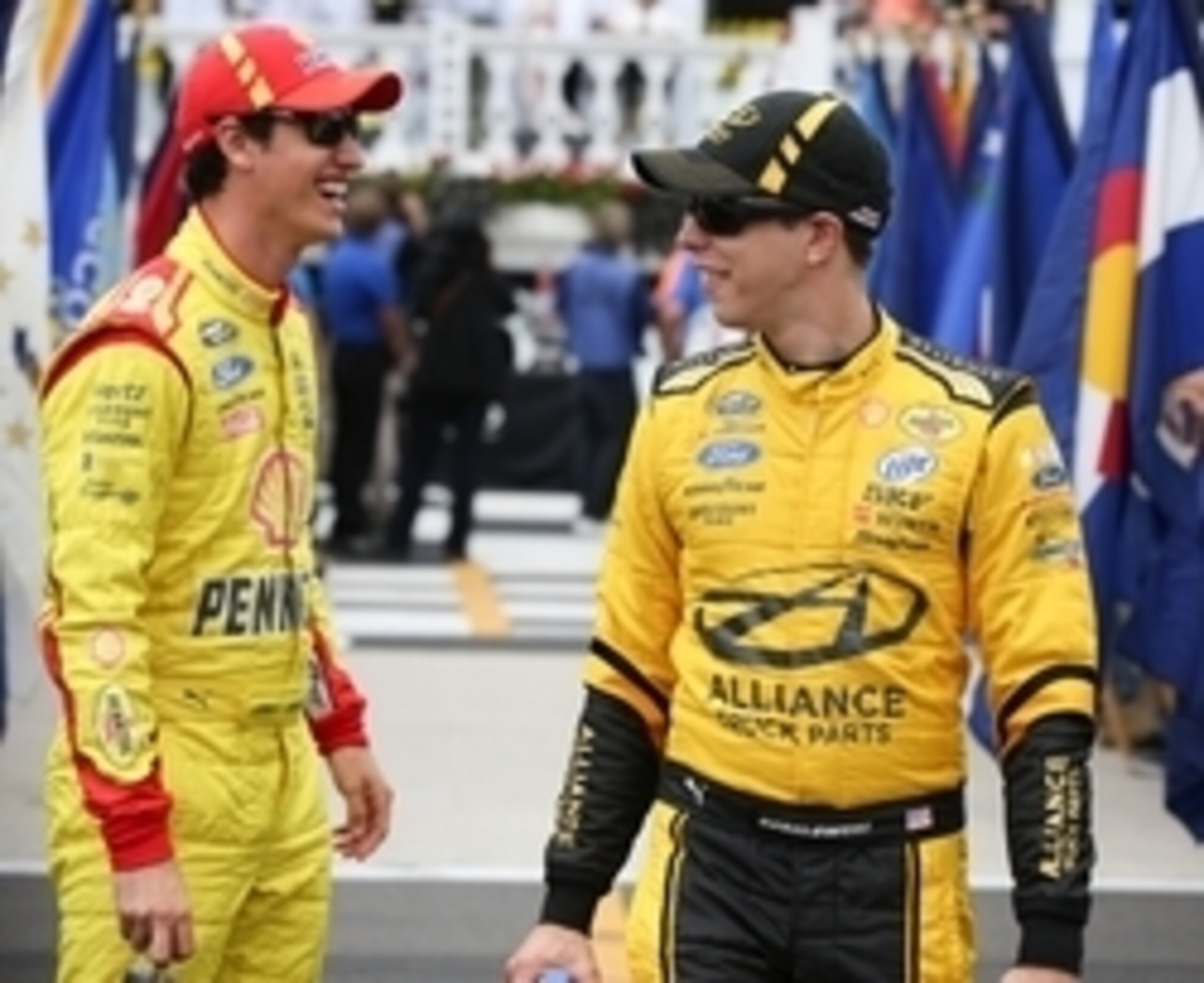 Joey Logano (left) shares a laugh with teammate Brad Keselowski Joey Logano (left) shares a laugh with teammate Brad Keselowski