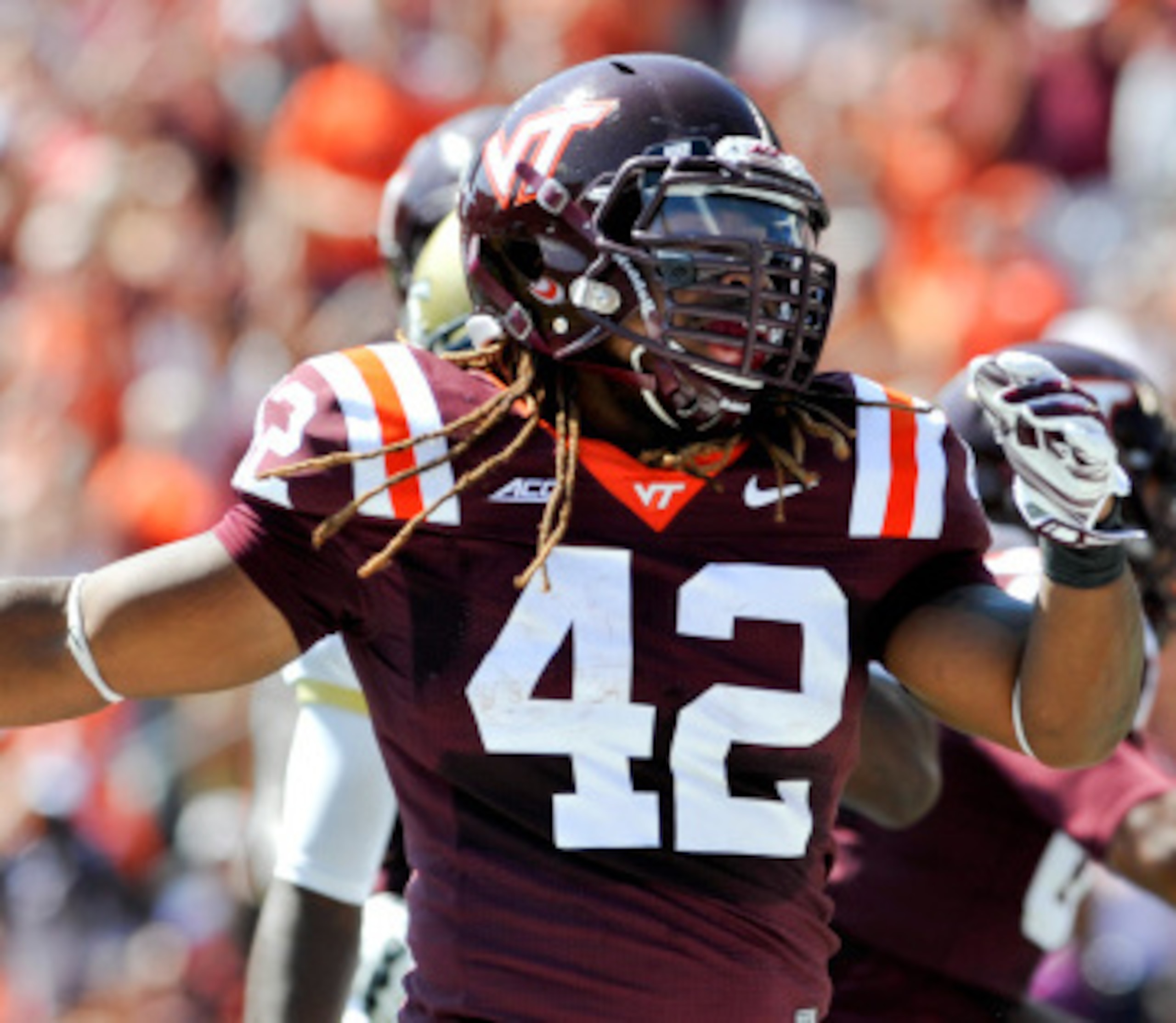 Virginia Tech running back Marshawn Williams celebrating a touchdown Virginia Tech running back Marshawn Williams celebrating a touchdown