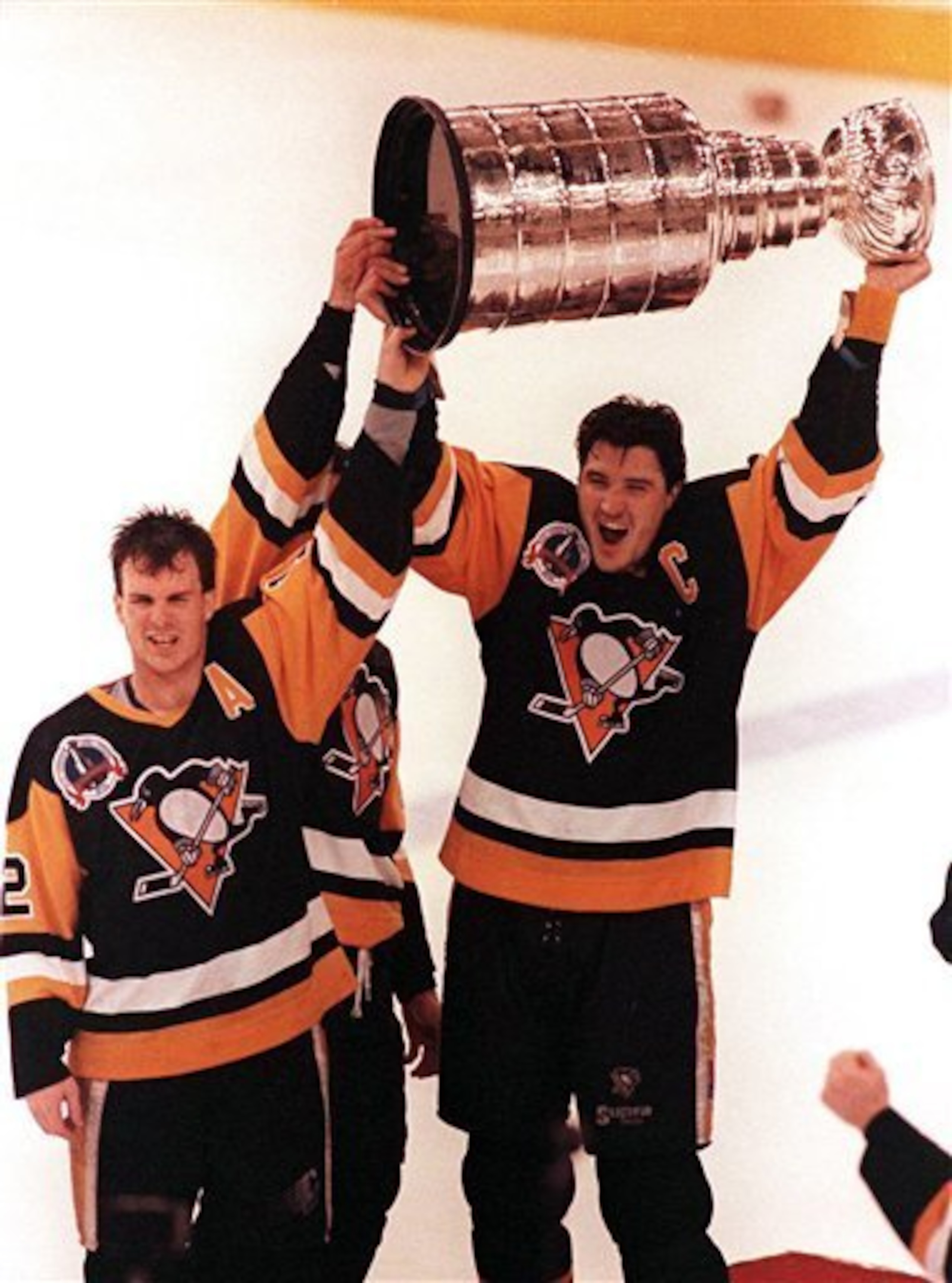 Mario Lemieux just had to check the Cup's buoyancy.