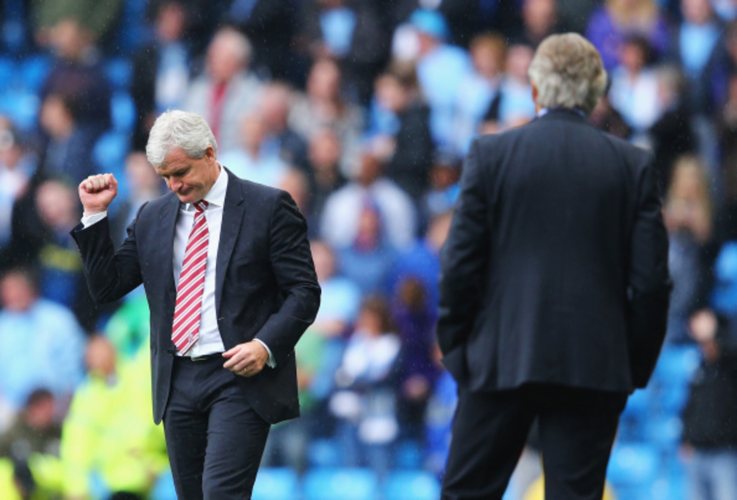 Hughes worked Pellegrini like a speed bag at the Etihad.