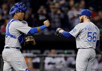 Manager Ned Yost can't be shy about using closer Greg Holland (right) and the rest of his big-armed bullpen.