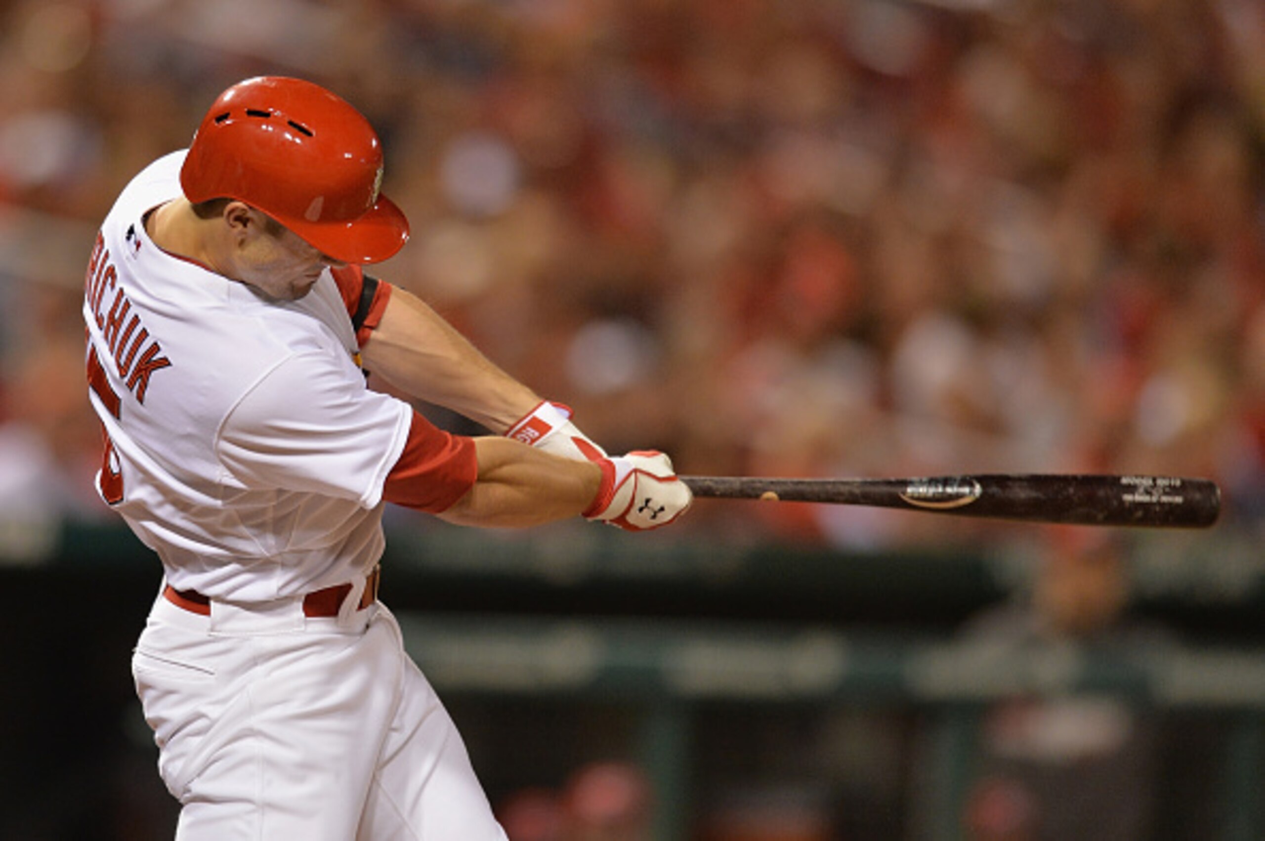 Randal Grichuk gets a hit against the Reds on Sept. 21.